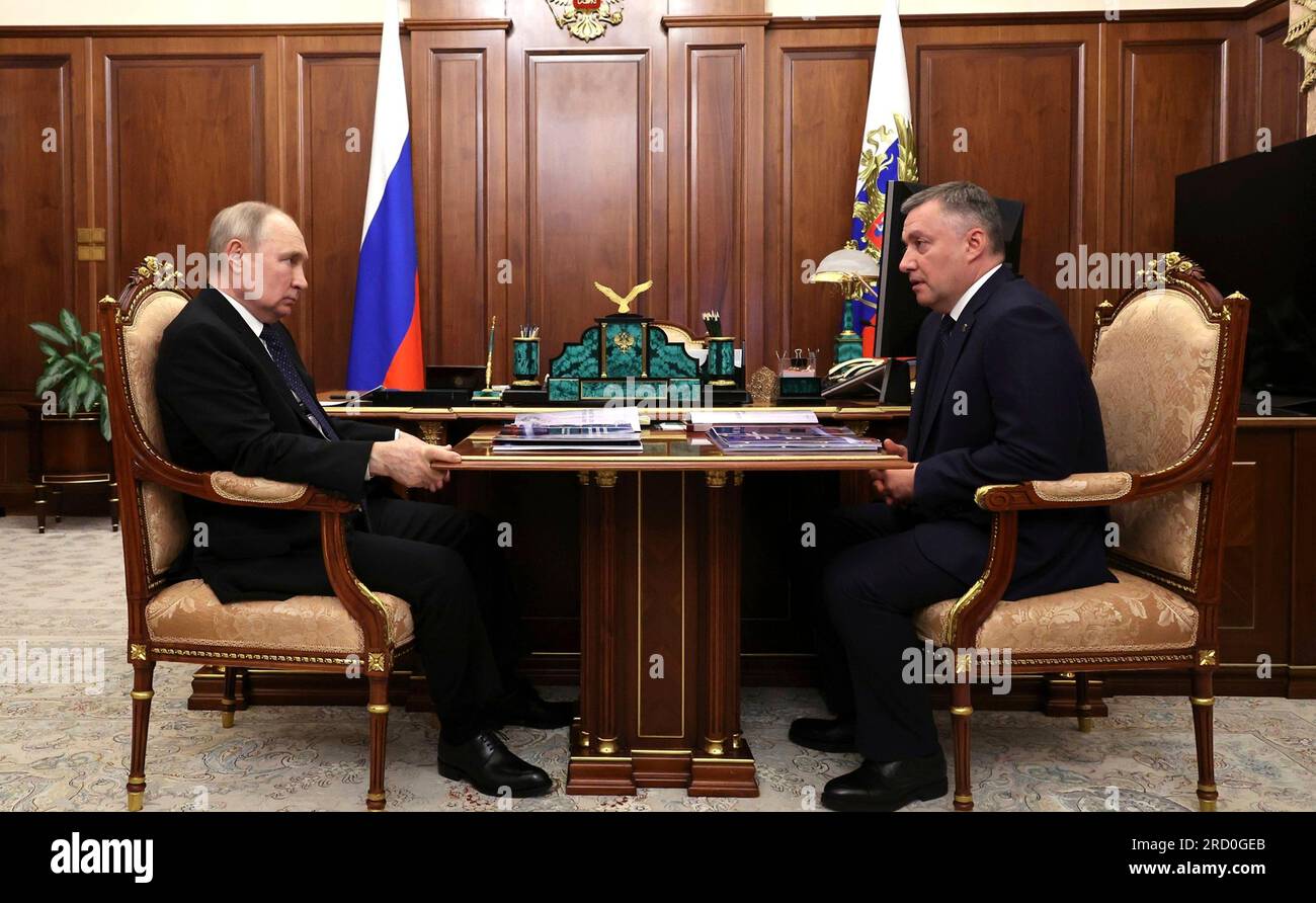 Moscow, Russia. 17th July, 2023. Russian President Vladimir Putin hosts a face-to-face meeting with Irkutsk Region Governor Igor Kobzev, right, at the Kremlin, July 17, 2023 in Moscow, Russia. Credit: Alexander Kazakov/Kremlin Pool/Alamy Live News Stock Photo