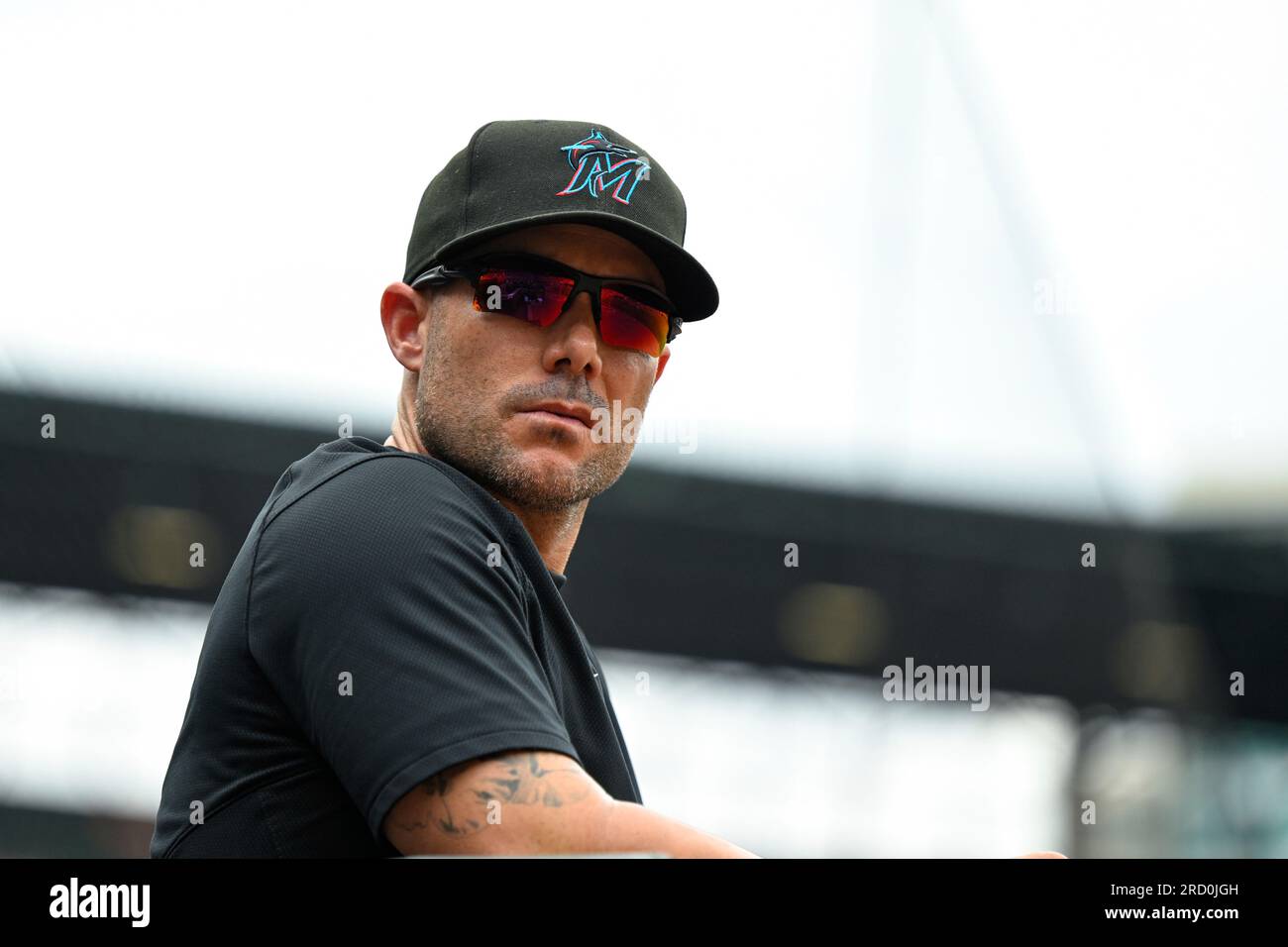 Miami Marlins manager Skip Schumaker looks on during a baseball