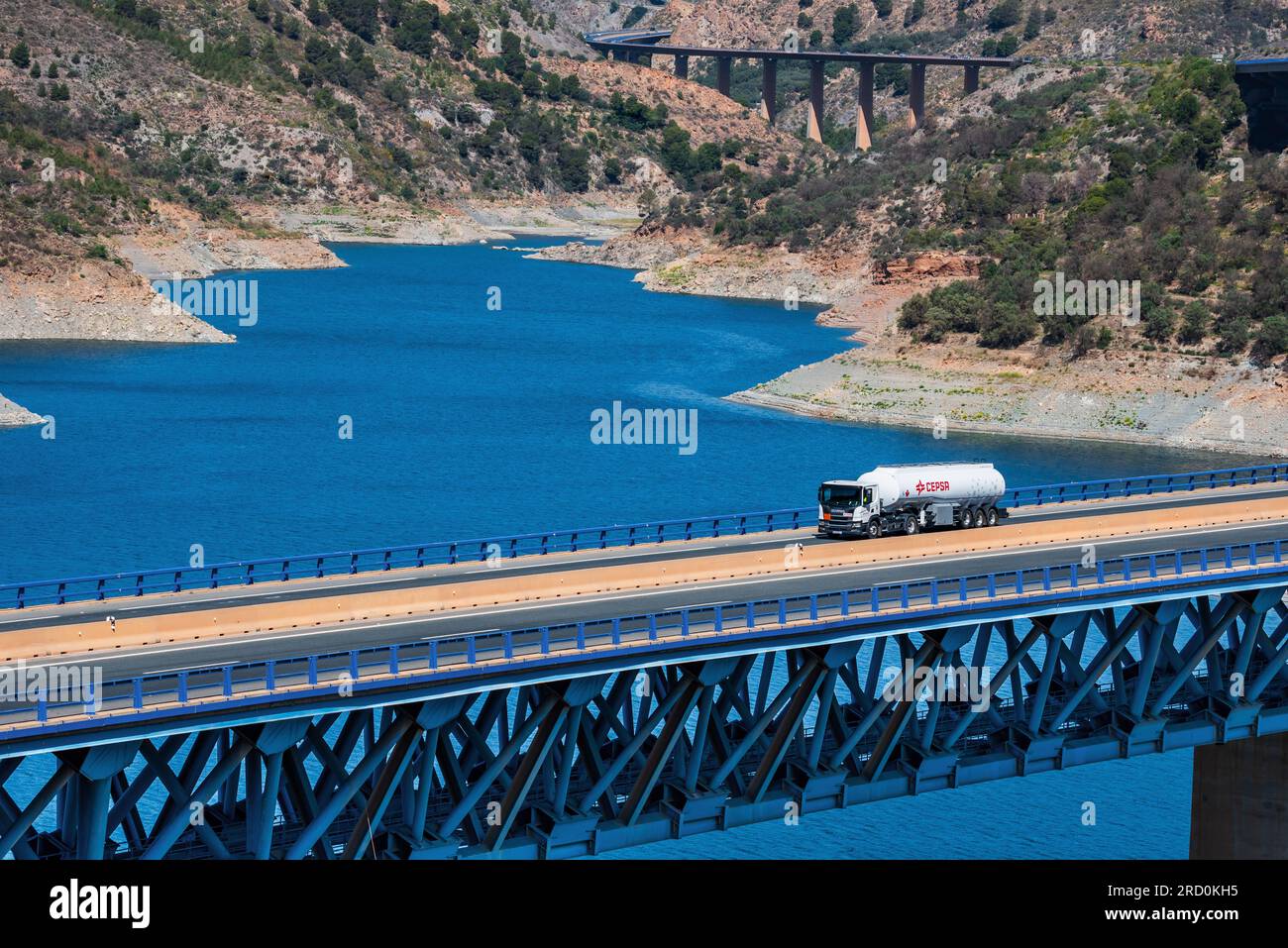Cepsa company tanker truck circulating through a viaduct. Stock Photo