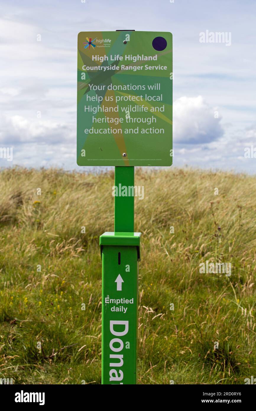 Dunnet Bay, Caithness, Scotland, July 7th, 2023, a donation post for the High Life, Highland countryside ranger service Stock Photo