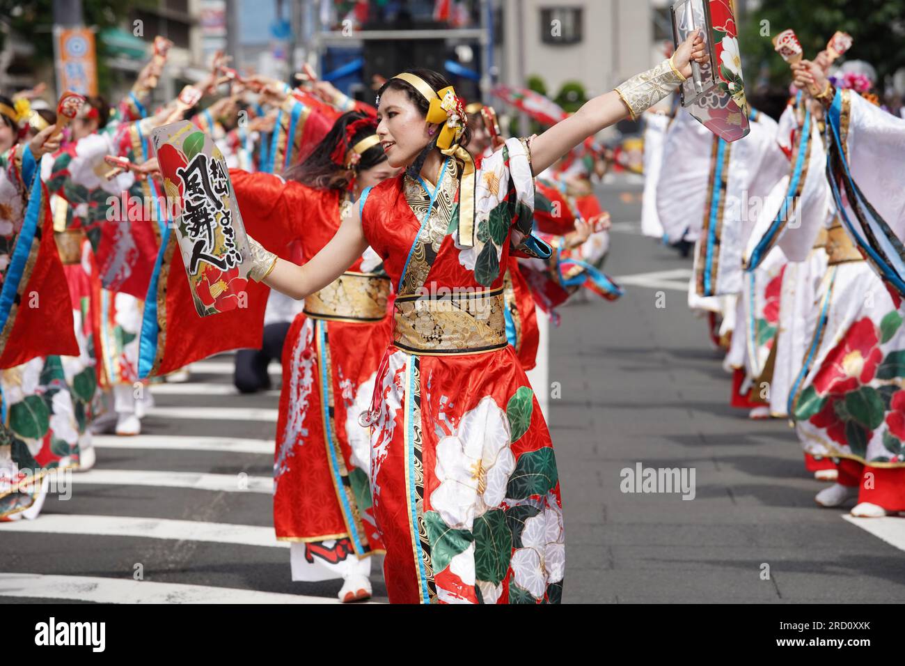 KAGAWA, JAPAN - JULY 15 2023: Japanese performers dancing in the famous Yosakoi Festival. Yosakoi is a unique style of Japanese dance event. Stock Photo