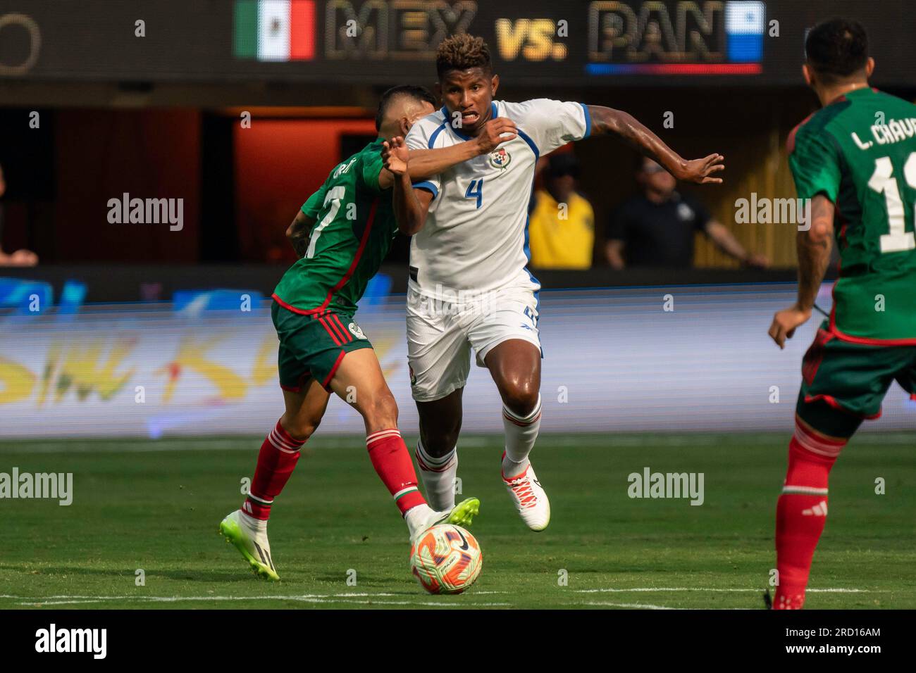 Panama defender Fidel Escobar (4) is fouled by Mexico midfielder Luis Romo (7) during the Concacaf 2023 Gold Cup final, Sunday, July 16, 2023, at SoFi Stock Photo