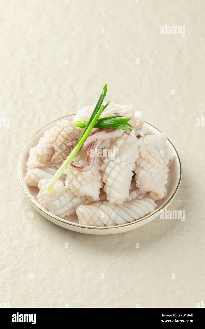 Squid, pineapple cut isolated on white background Stock Photo Alamy