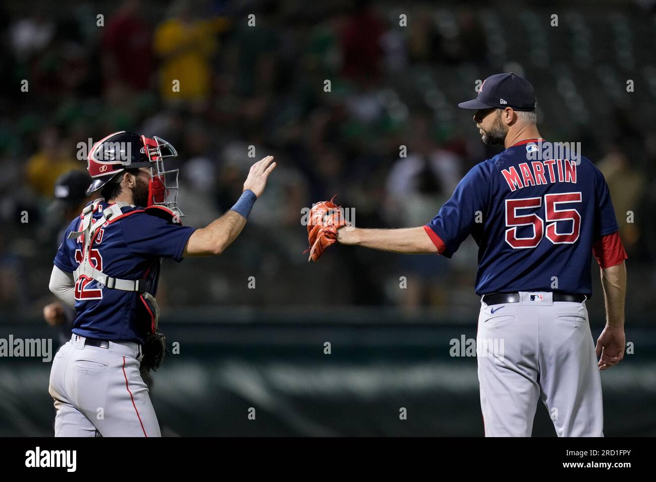 Boston Red Sox catcher Connor Wong, left, and pitcher Chris Martin