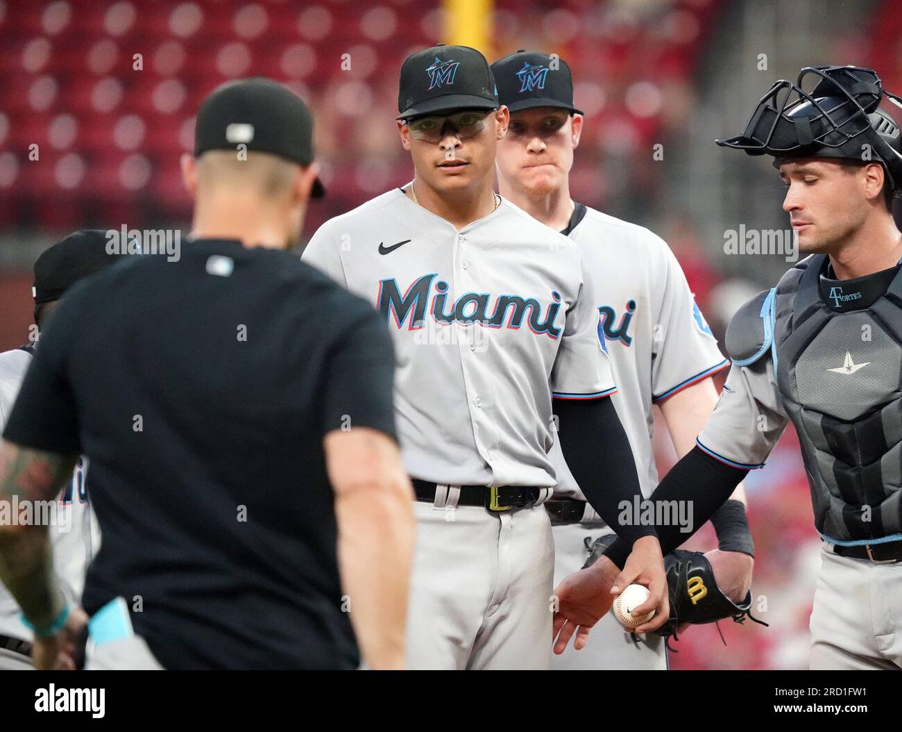 Miami Marlins manager Skip Schumaker walks off the field after