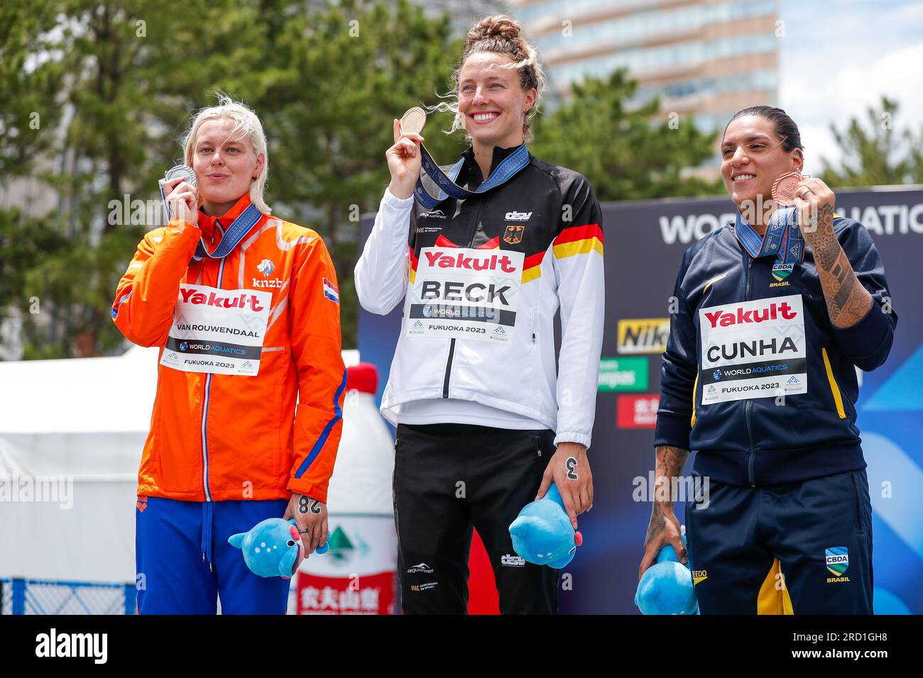 Fukuoka, Japan. 18th July, 2023. FUKUOKA, JAPAN - JULY 18: Sharon van Rouwendaal of the Netherlands, Leonie Beck of Germany and Ana Marcela Cunha of Brasil during the podium ceremony after competing in Open Water Women's 5km on Day 5 of the Fukuoka 2023 World Aquatics Championships at the Seaside Momochi Beach Park on July 18, 2023 in Fukuoka, Japan (Photo by Nikola Krstic/BSR Agency) Credit: BSR Agency/Alamy Live News Stock Photo