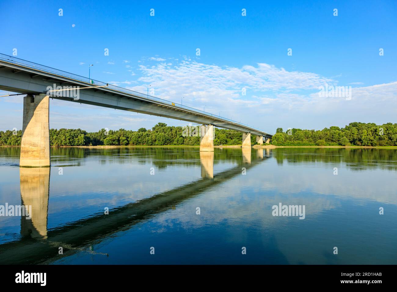 Szent-Laszlo bridge, danube bridge in southern hungary, Szekszárd, early in the morning, blue sky, trees, Szent-Laszlo-Brücke, water, river cruise, Stock Photo