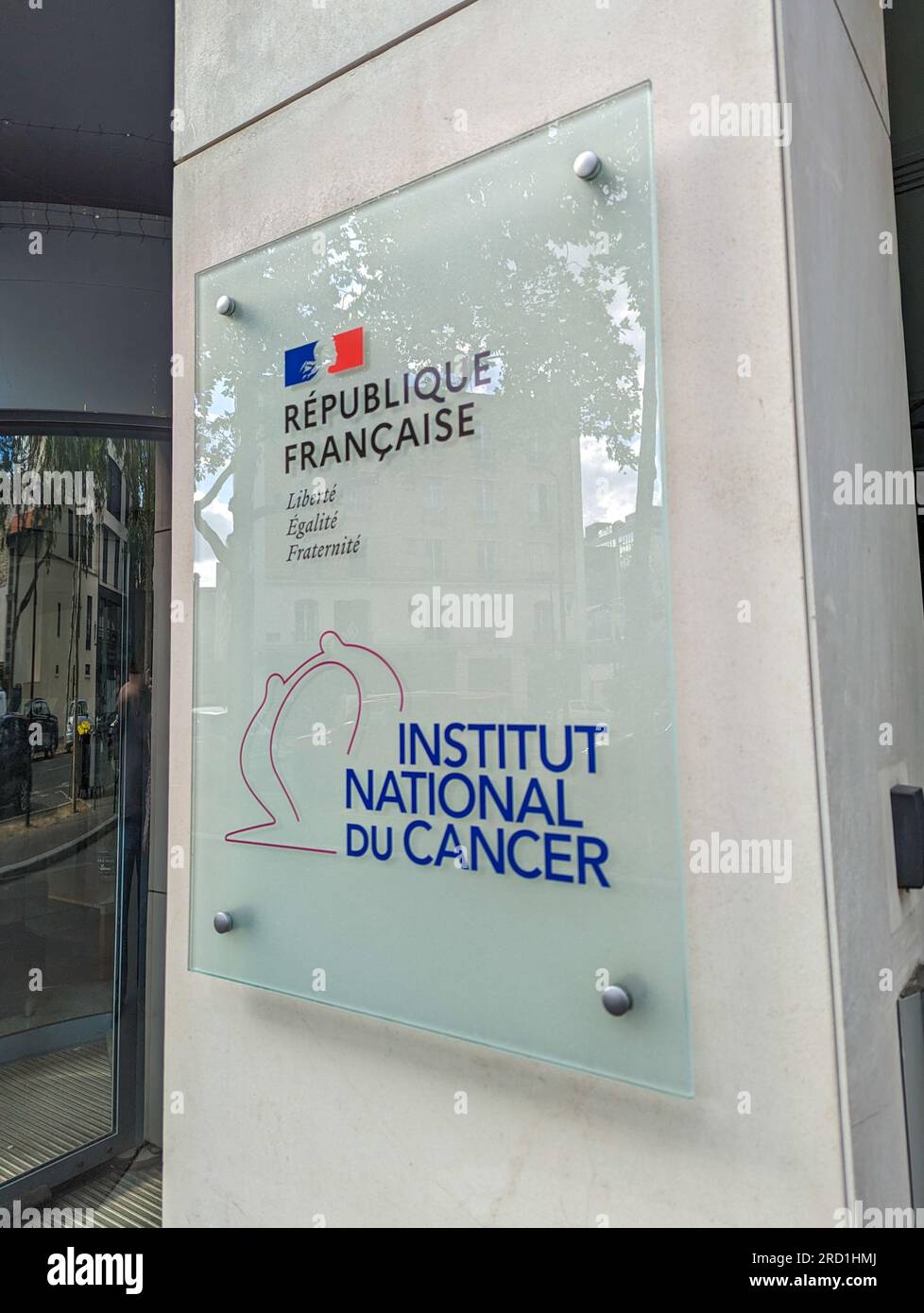 Sign at the entrance to the National Cancer Institute, a French organization in charge of coordinating scientific research and fight against cancer Stock Photo