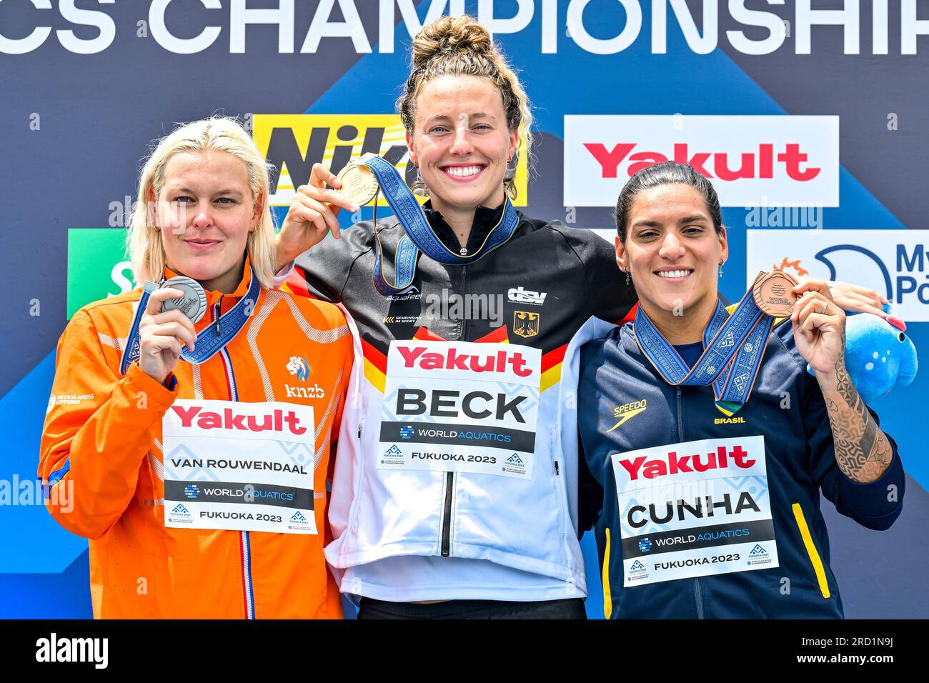 Fukuoka, Japan. 18th July, 2023. Sharon Van Rouwendaal of the Netherlands, silver, Leonie Beck of Germany, gold, Ana Marcela Cunha of Brasil, bronze show the medals after competing in the 5km Women during the 20th World Aquatics Championships at the Seaside Momochi Beach Park in Fukuoka (Japan), July 18th, 2023. Credit: Insidefoto di andrea staccioli/Alamy Live News Stock Photo