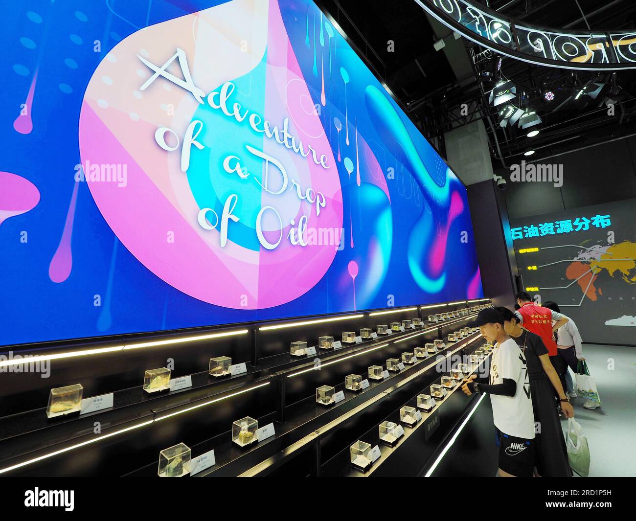 Children visit a science popularization exhibition during summer