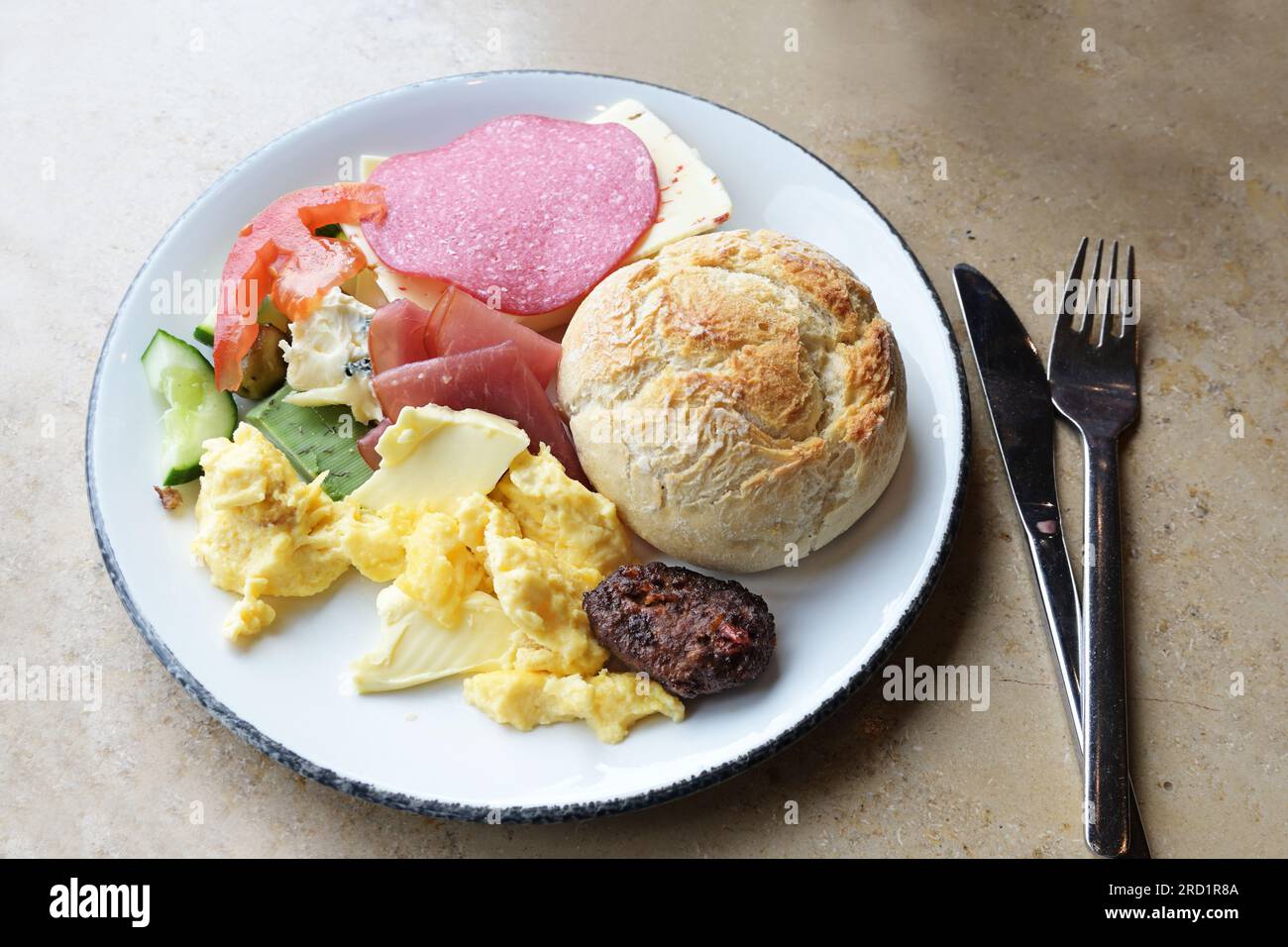 Plate with scrambled egg and bacon on white background Stock Photo - Alamy