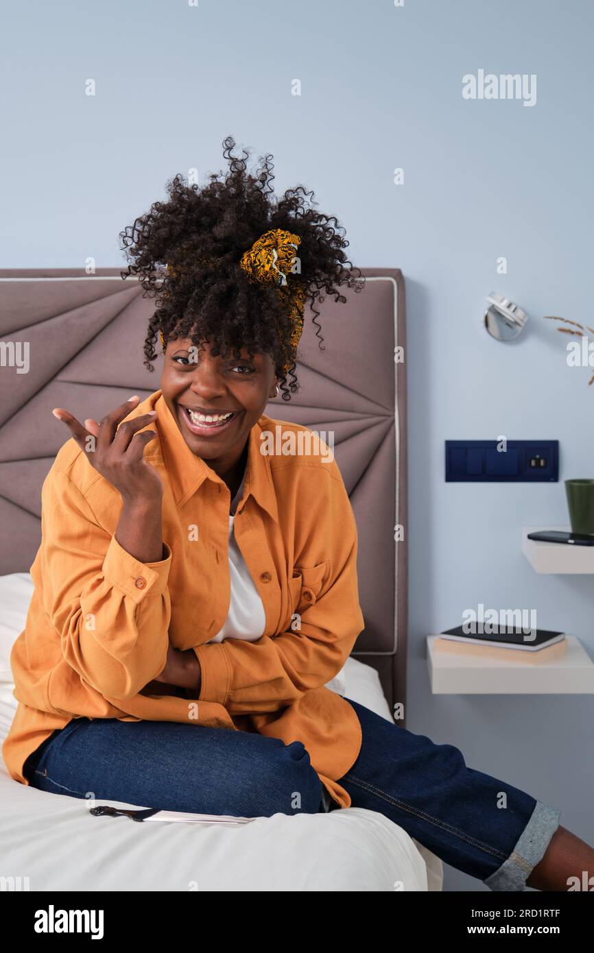 Pretty young black female laughing hi-res stock photography and images ...