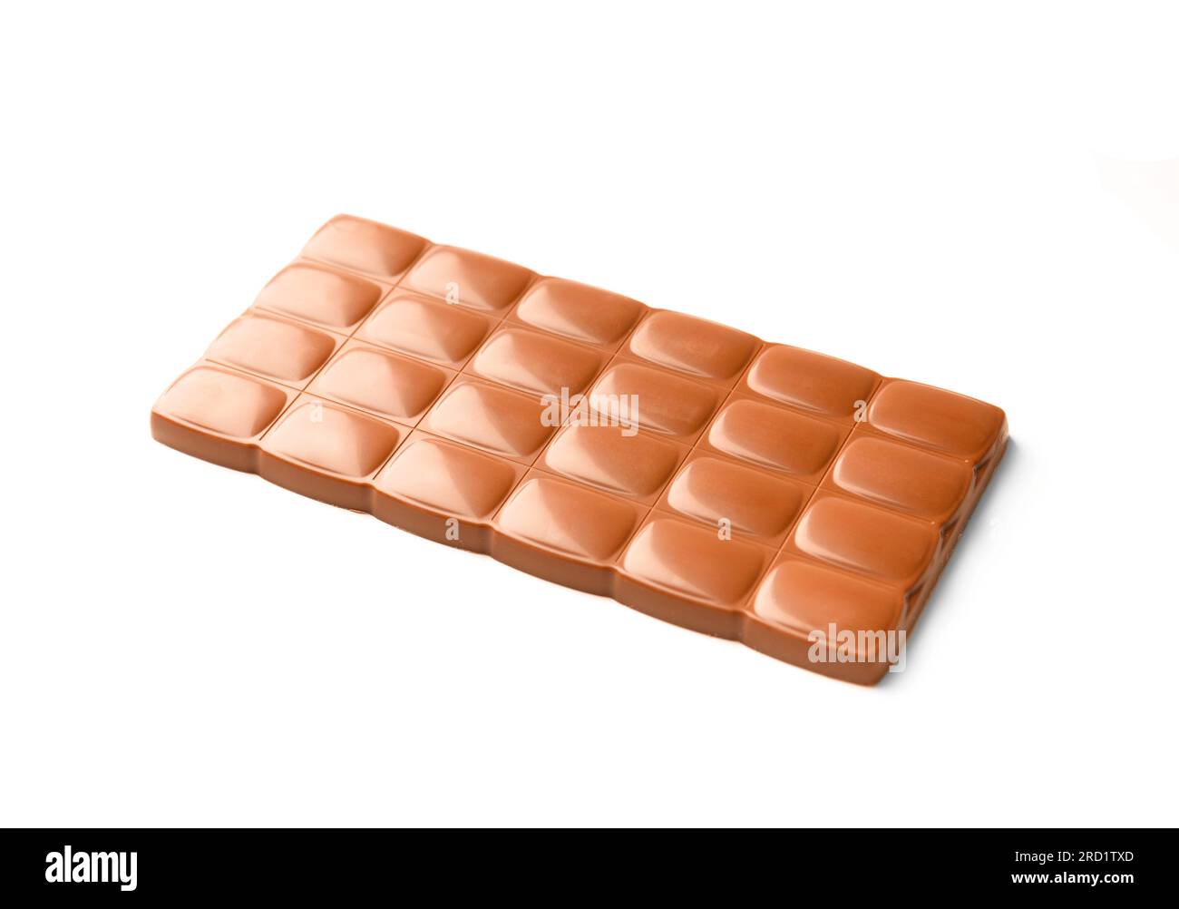 Large whole bar of milk chocolate with nuts on a white background, chocolate on white isolated. Stock Photo