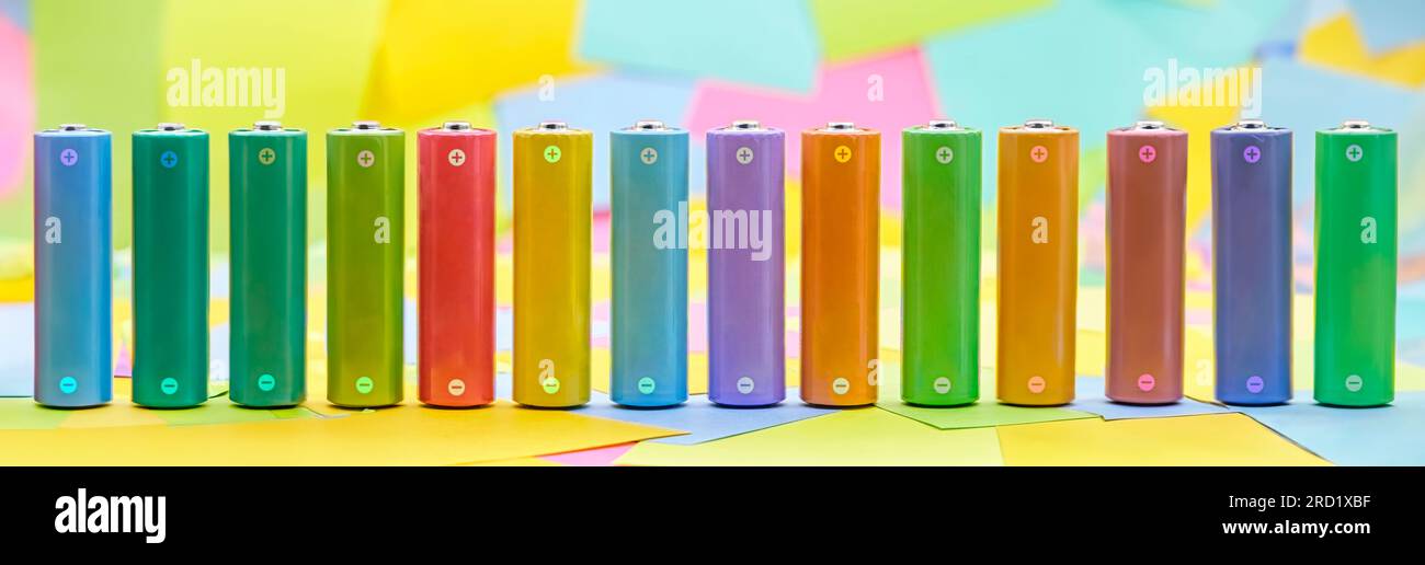 Cylindrical batteries of various colors with multicolored paper sticky ...