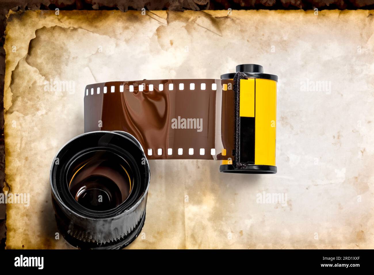 photo film in cartridge on old background Stock Photo - Alamy