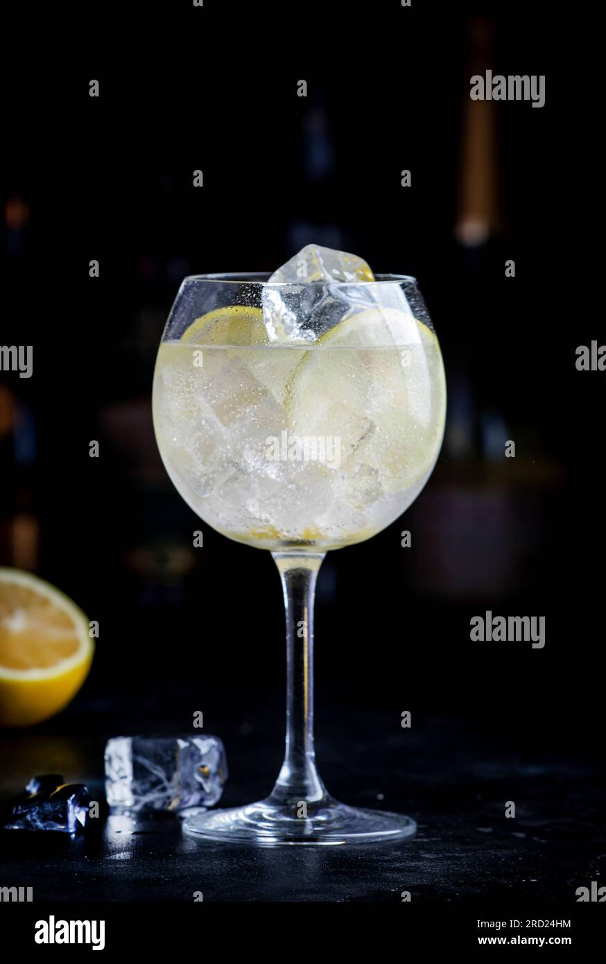 Martini tonic alcoholic cocktail with white vermouth, tonic, lemon and