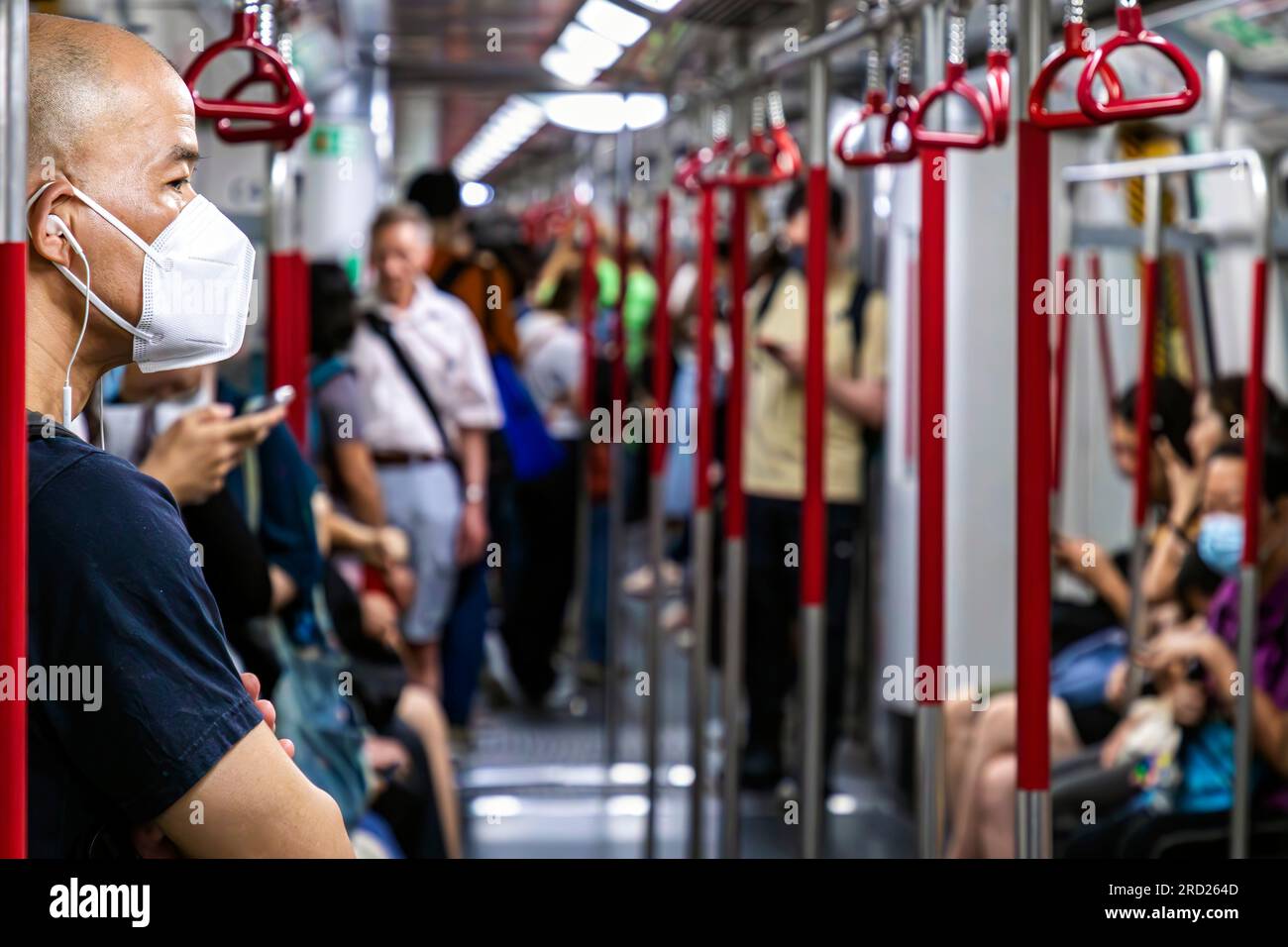 Passengers on MTR rapid transit train, Hong Kong, SAR, China Stock Photo