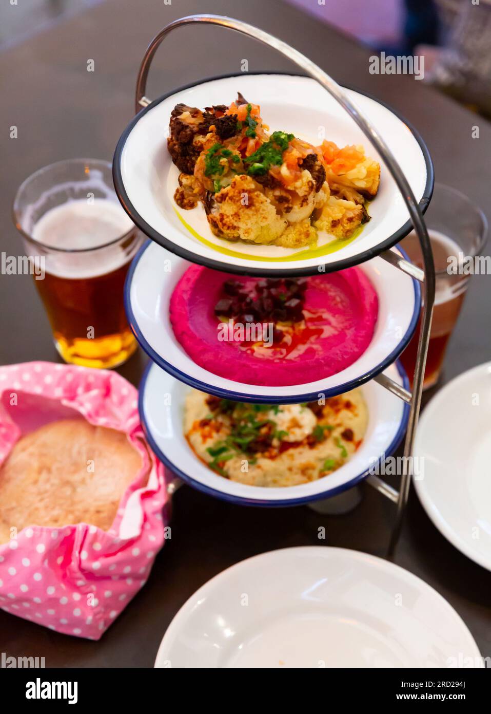 Different types of meze dishes served on table Stock Photo
