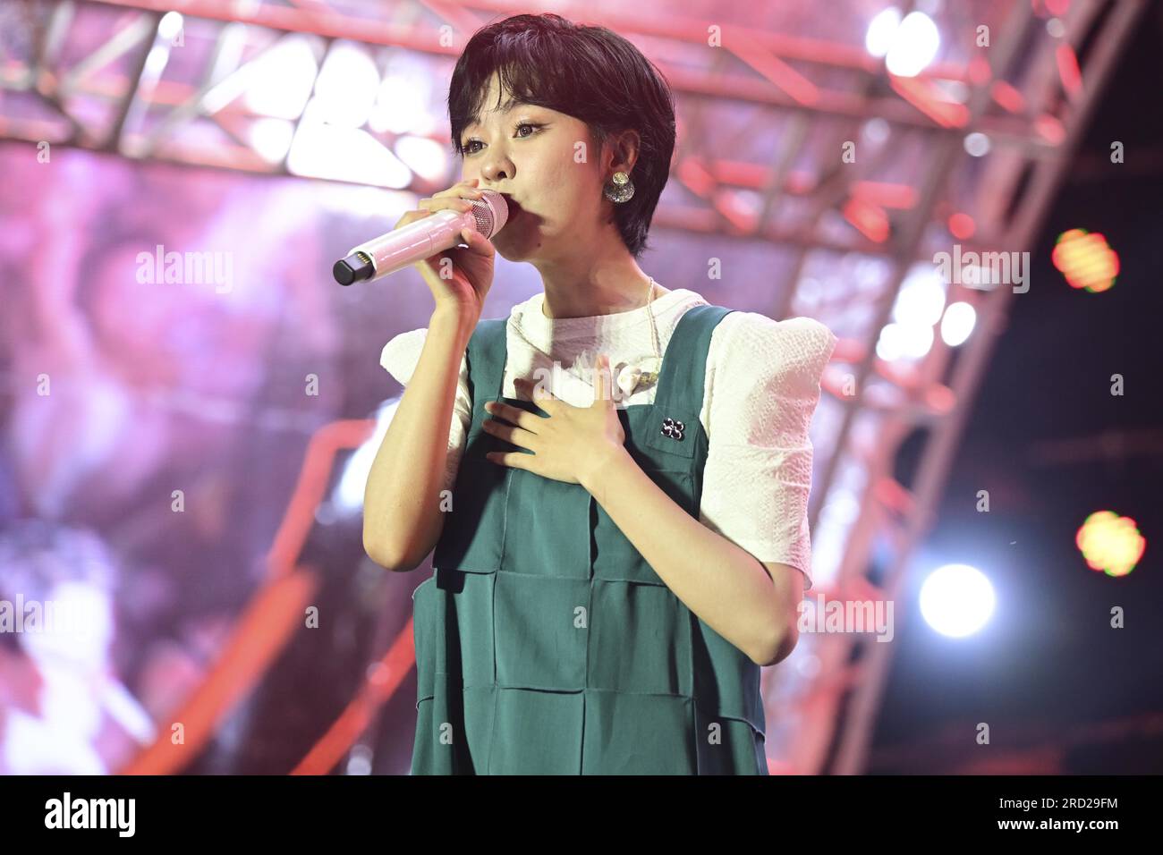 Chinese singer Yisa Yu performs at a beer music festival in Suzhou City