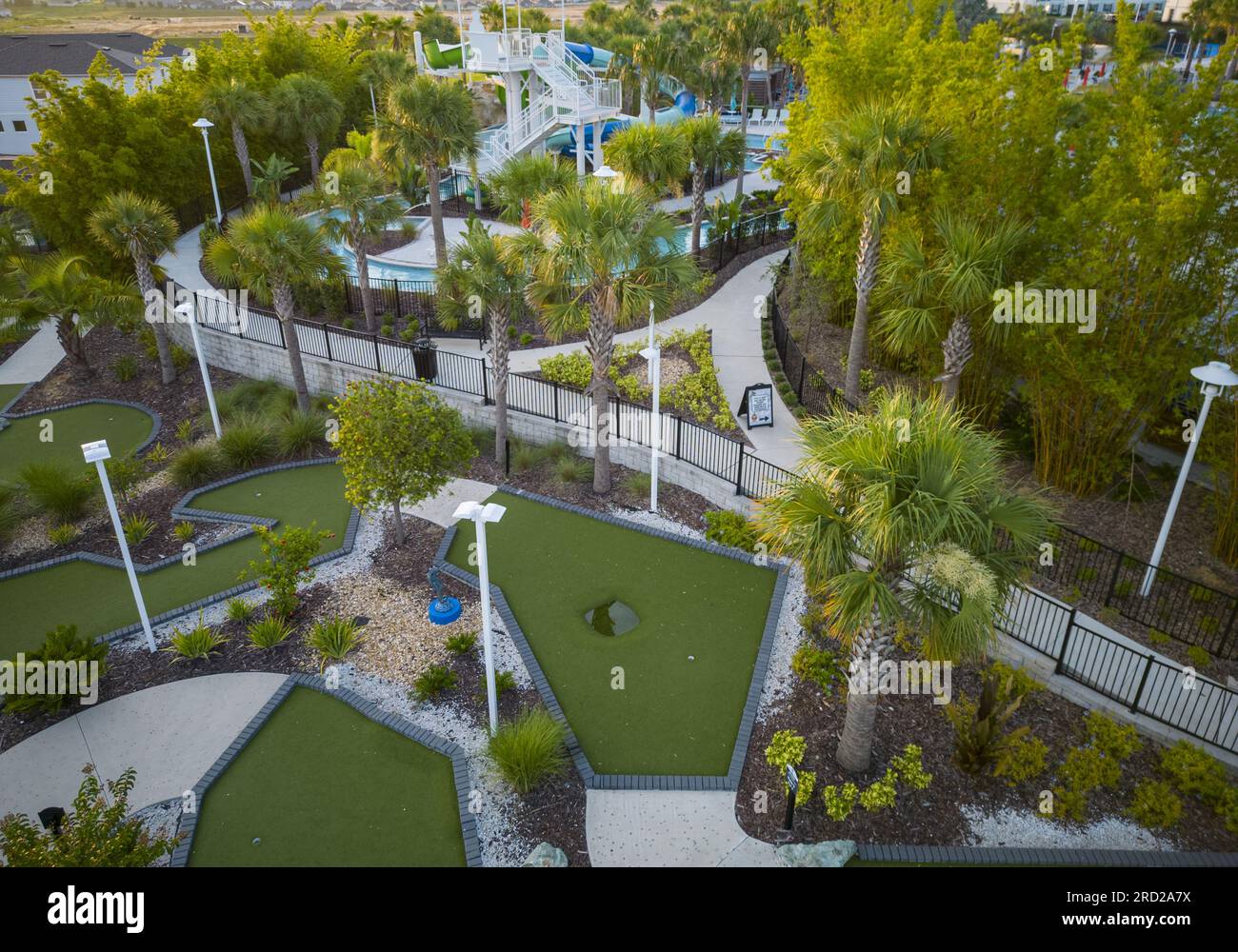 Looking down from a drone of a small mini golf and pool area at a resort in Florida before it opens. Stock Photo