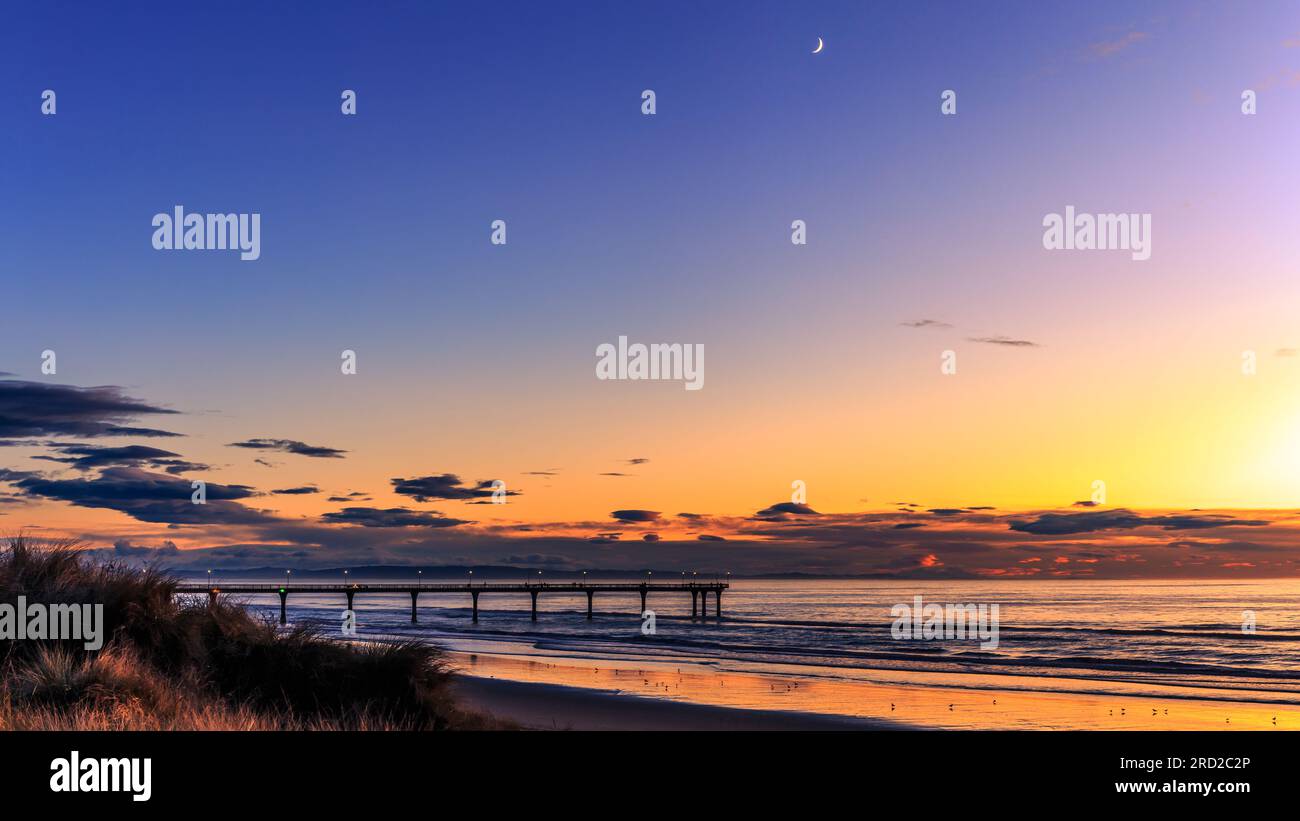 Matariki sunrise at New Brighton Beach, Christchurch, South Island, New Zealand Stock Photo