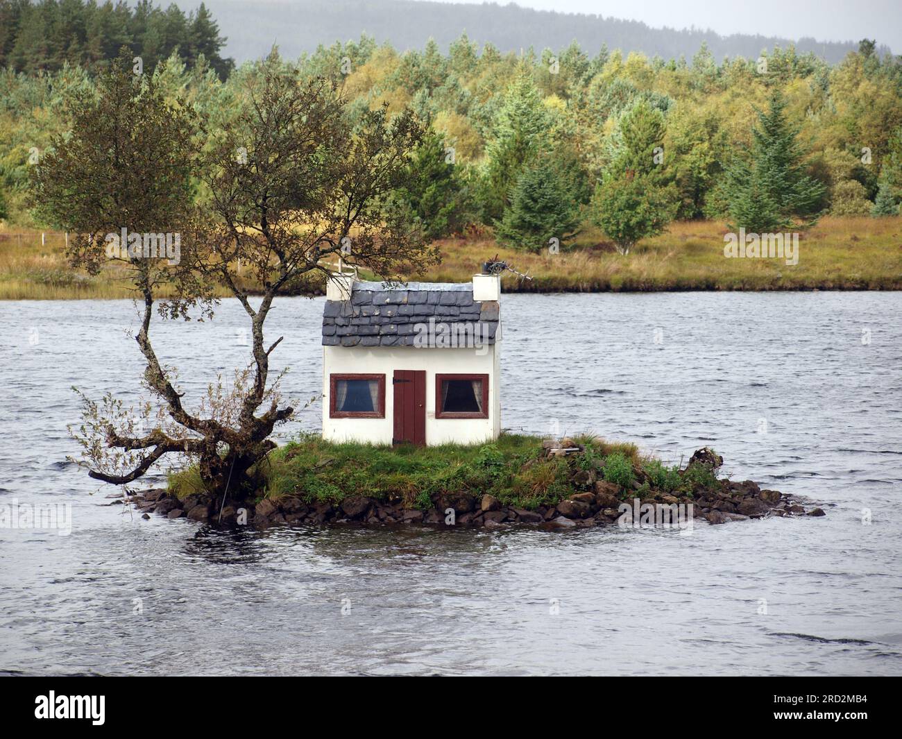 Tiny House on Tiny Isle Stock Photo