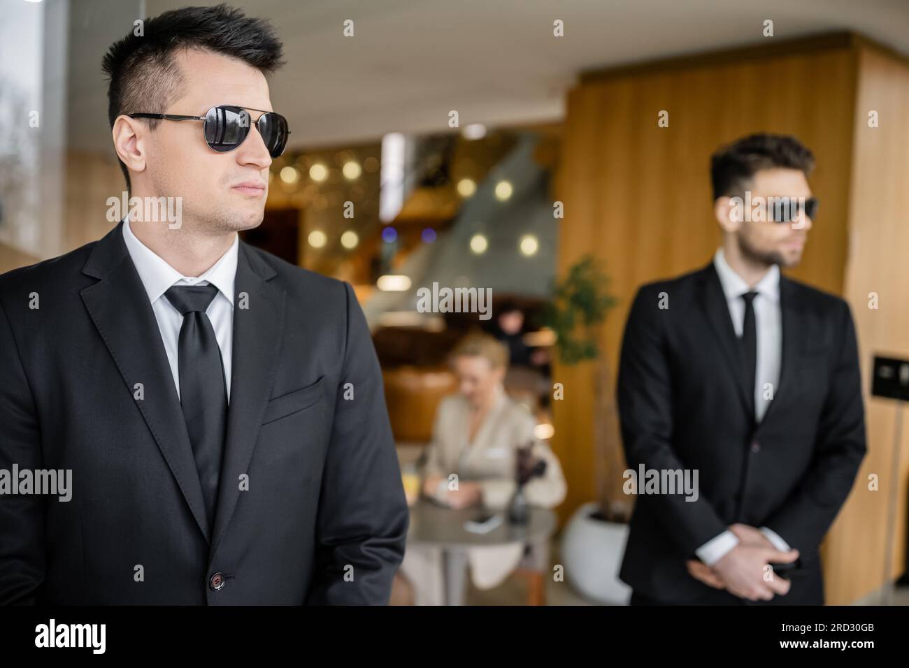 private security service, personal safety concept, handsome bodyguards