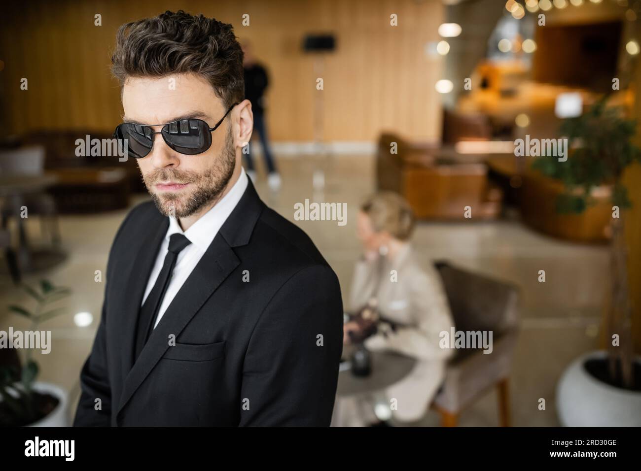 private security service, personal safety concept, handsome bodyguard