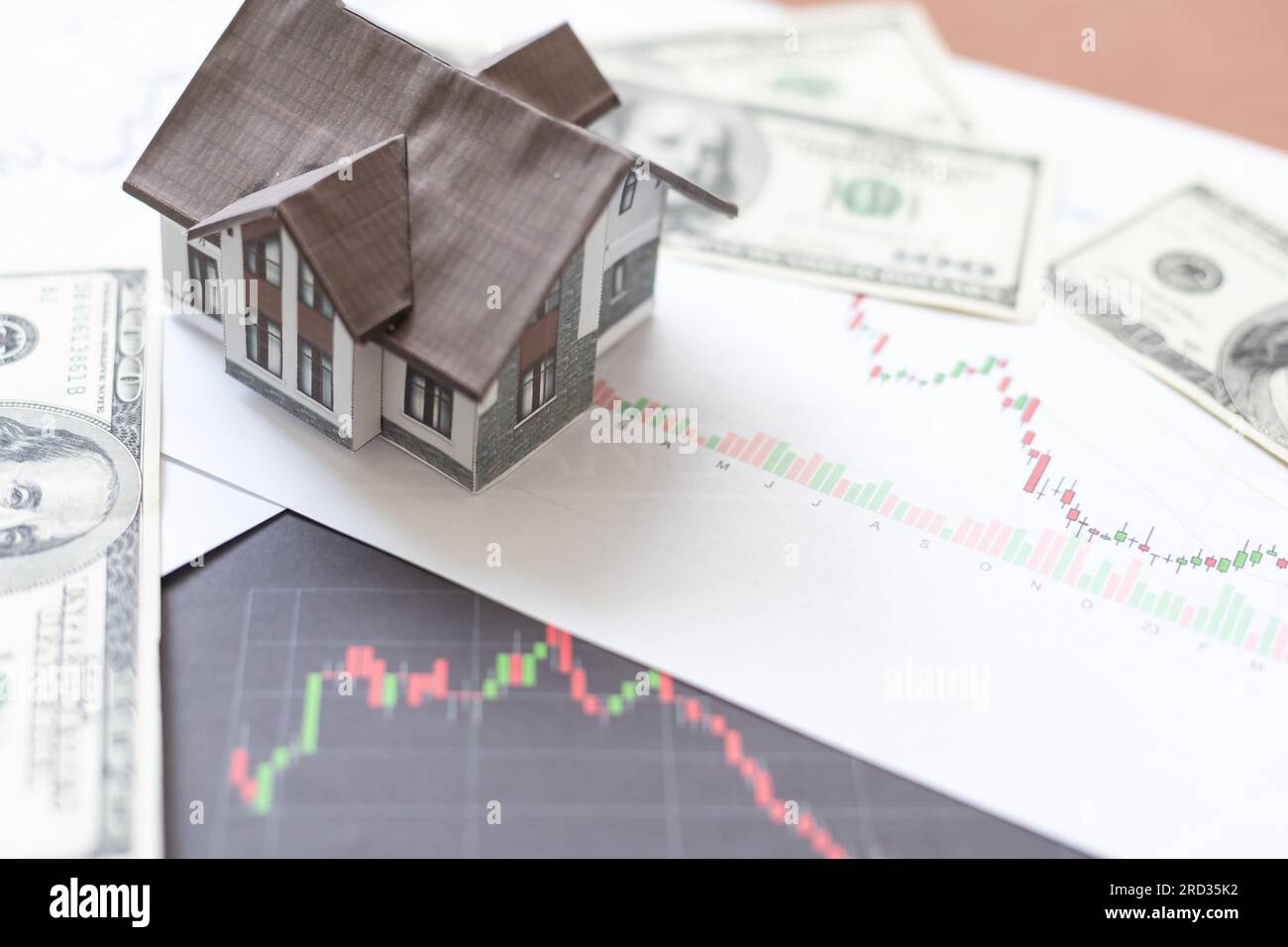 Model House Purchase Model house for sale and graphs. Real estate concept Stock Photo - Alamy