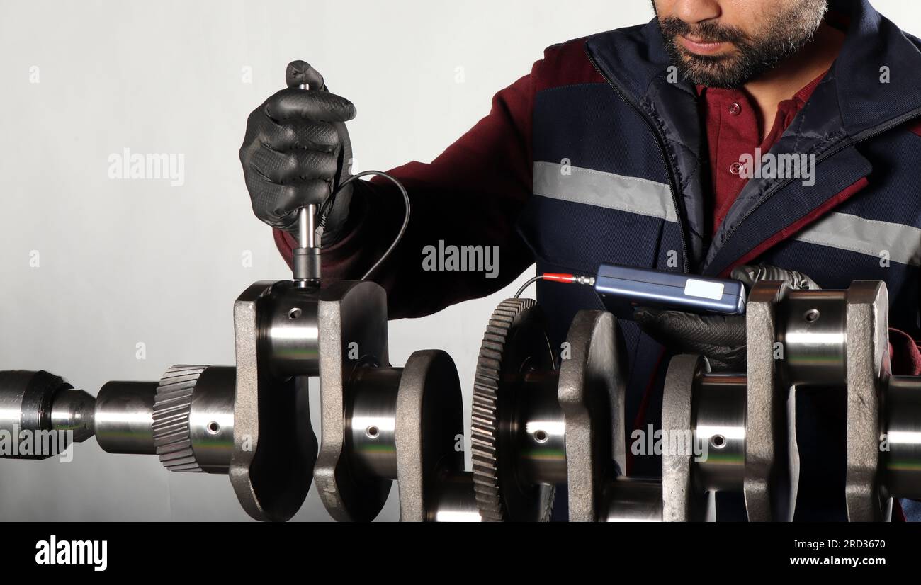 Master makes metal hardness measurement. Crankshaft Stock Photo Alamy