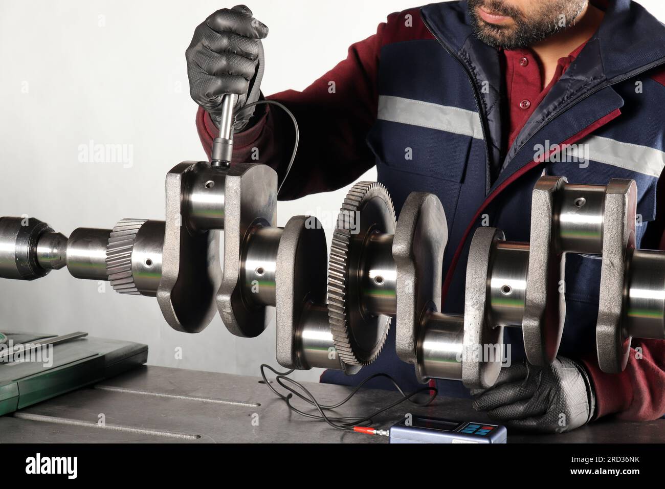Master makes metal hardness measurement. Crankshaft Stock Photo Alamy