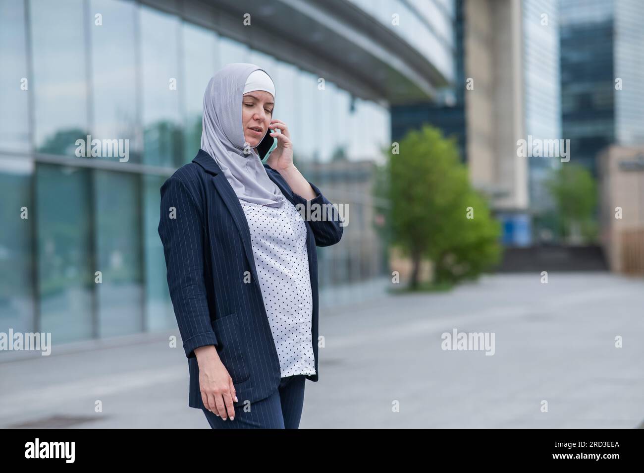 Pretty woman in hijab walking hi-res stock photography and images - Alamy
