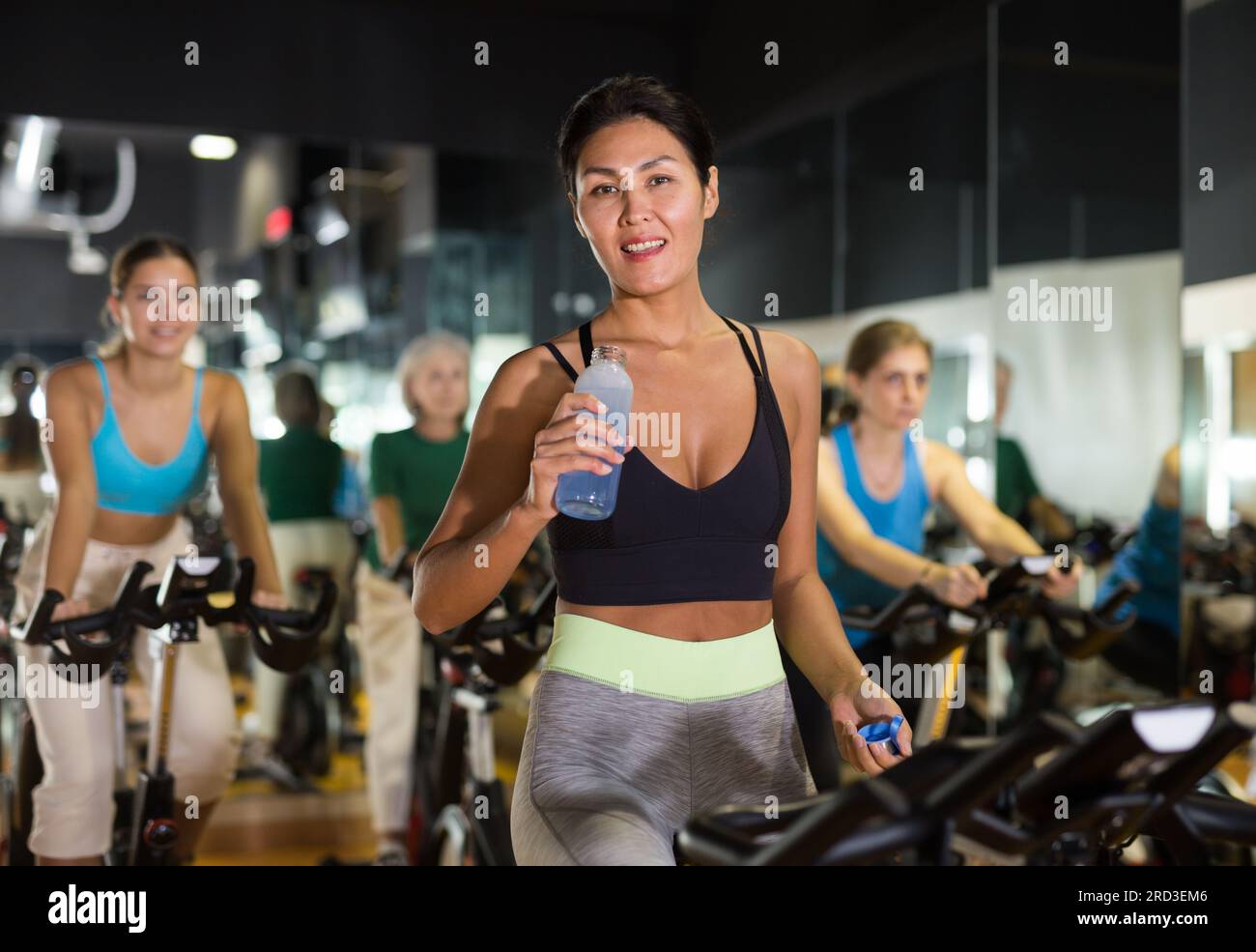 Japanese woman standing gym smiling hi-res stock photography and images ...