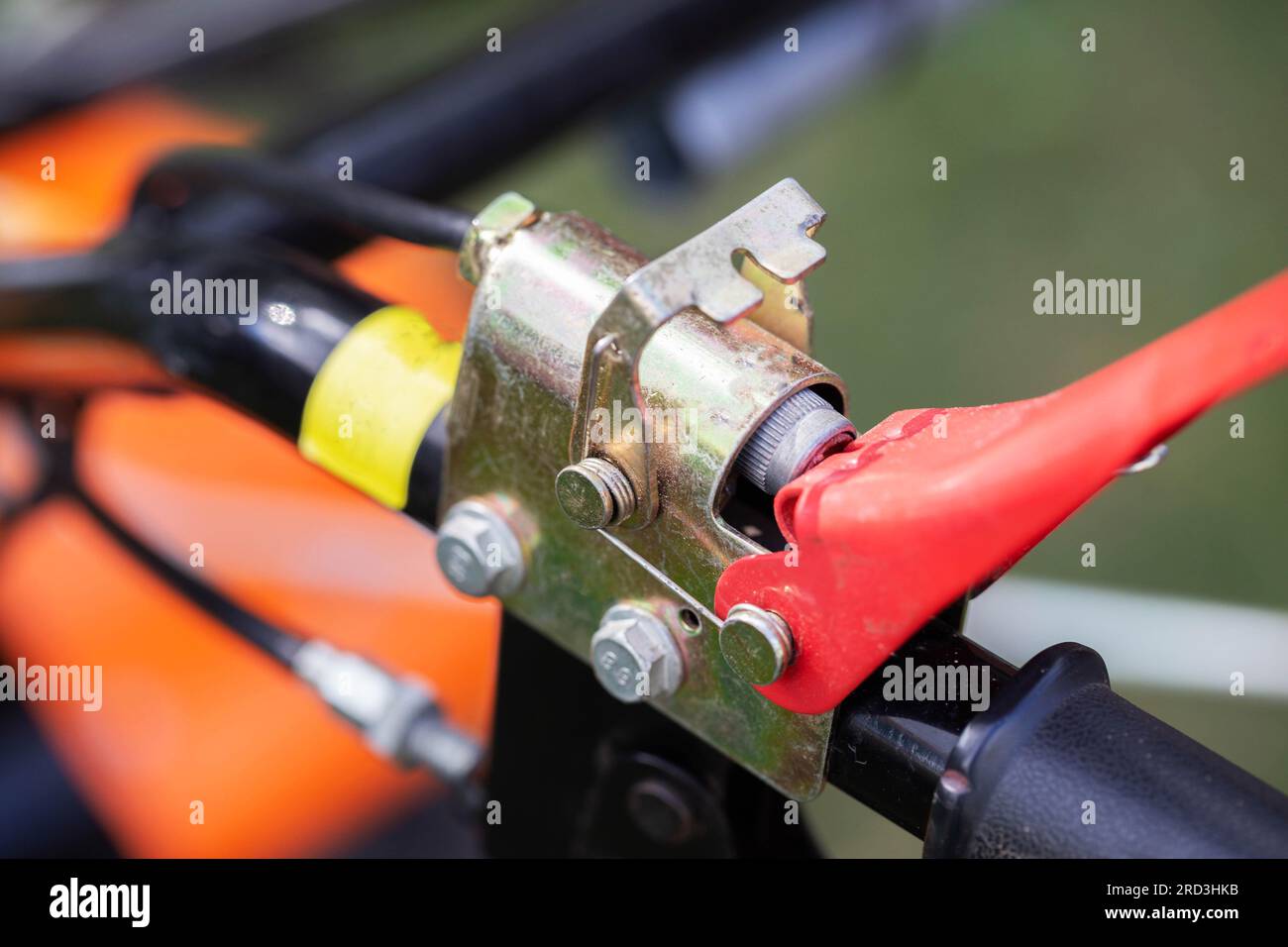 button for safely turning off the engine of the walkbehind tractor