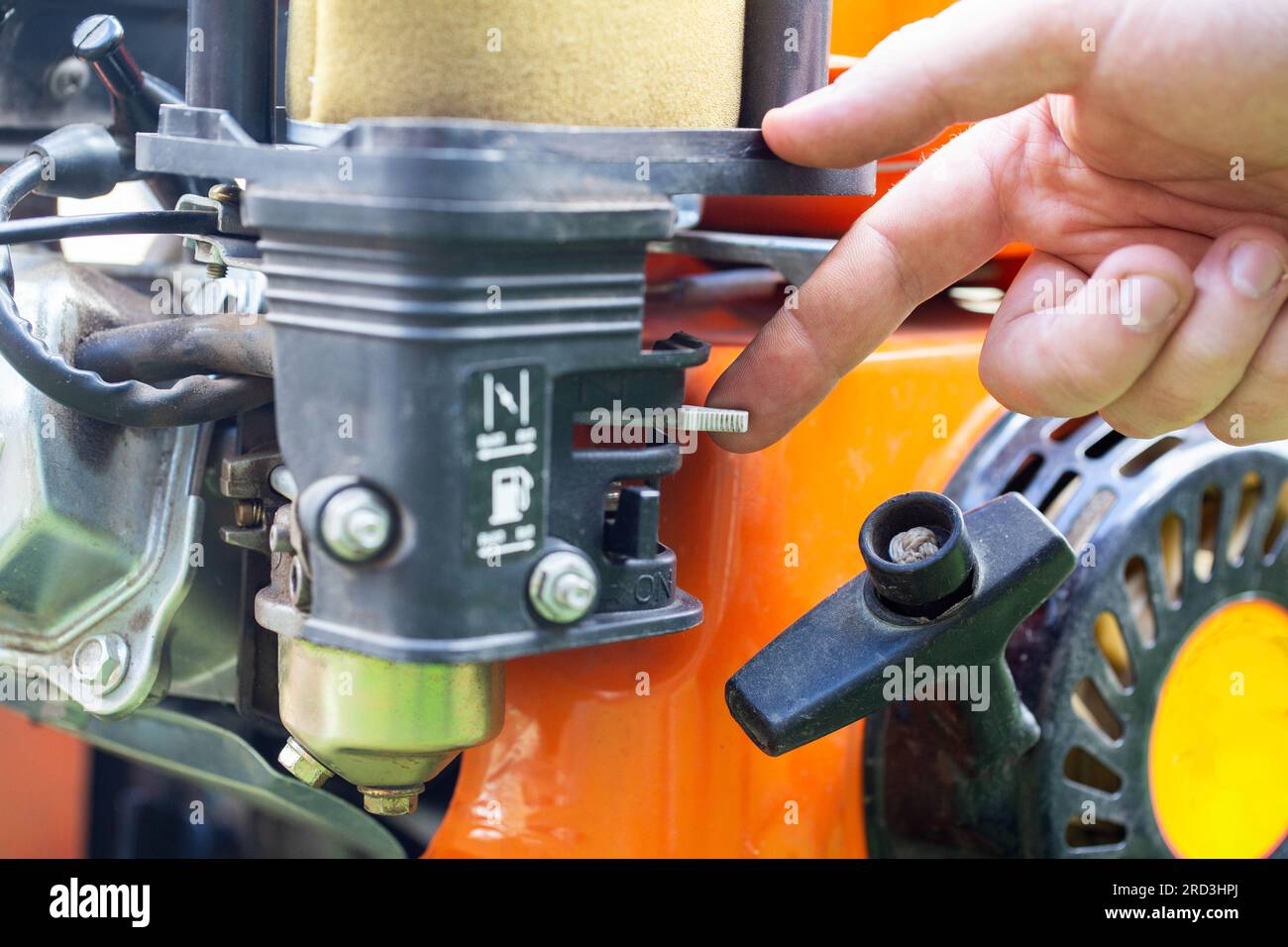 Choke opening switch in carburetor for cold start Stock Photo Alamy