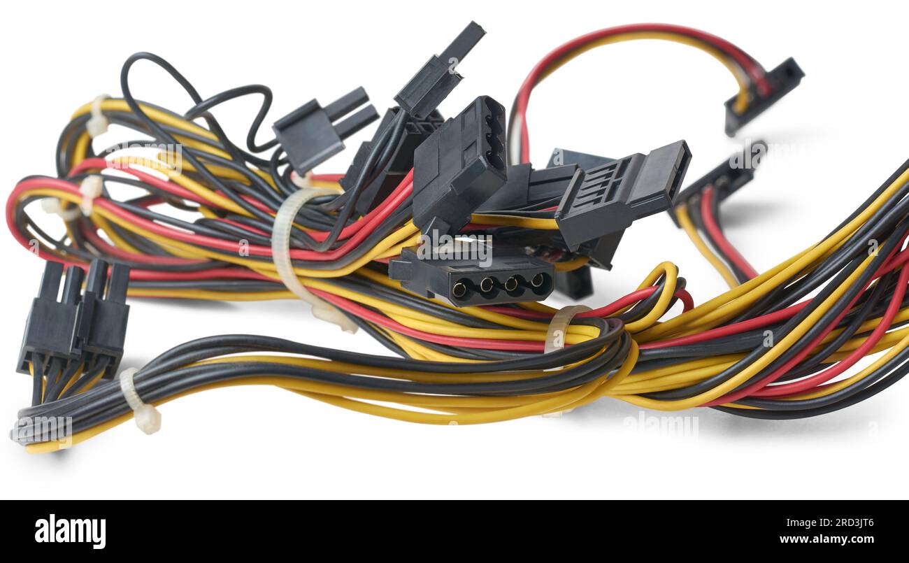 close-up of computer power supply cables, multicolored pc wiring harness isolated on white background, taken in selective focus with shadows Stock Photo