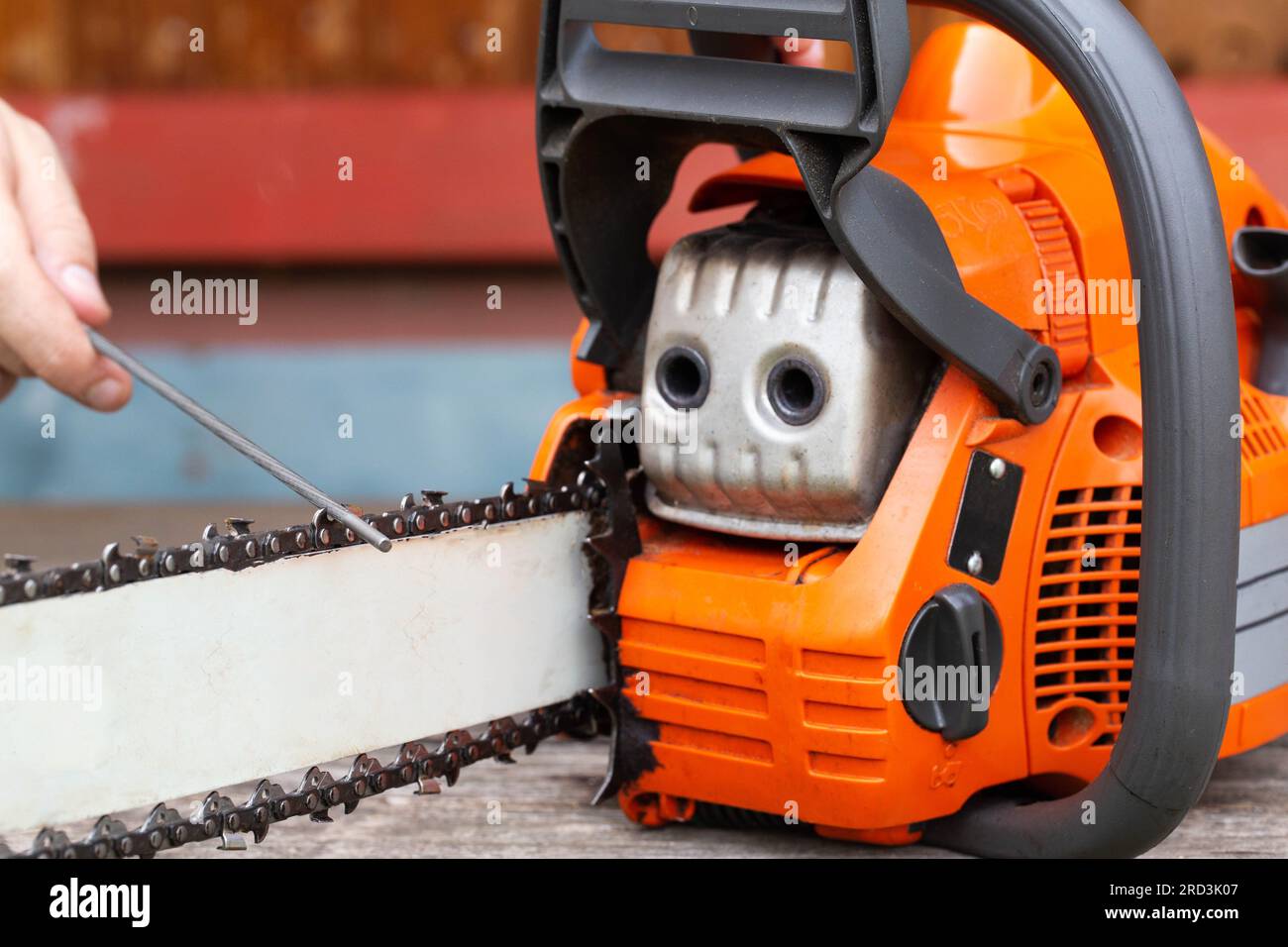 chainsaw chain sharpening with a special file. Dulling an old chain on