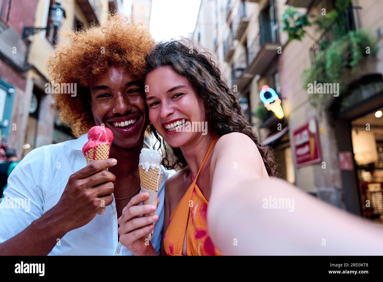 Premium Photo  Multiethnic friends in an ice cream parlor sitting eating  an ice cream summer showing off the ice creams