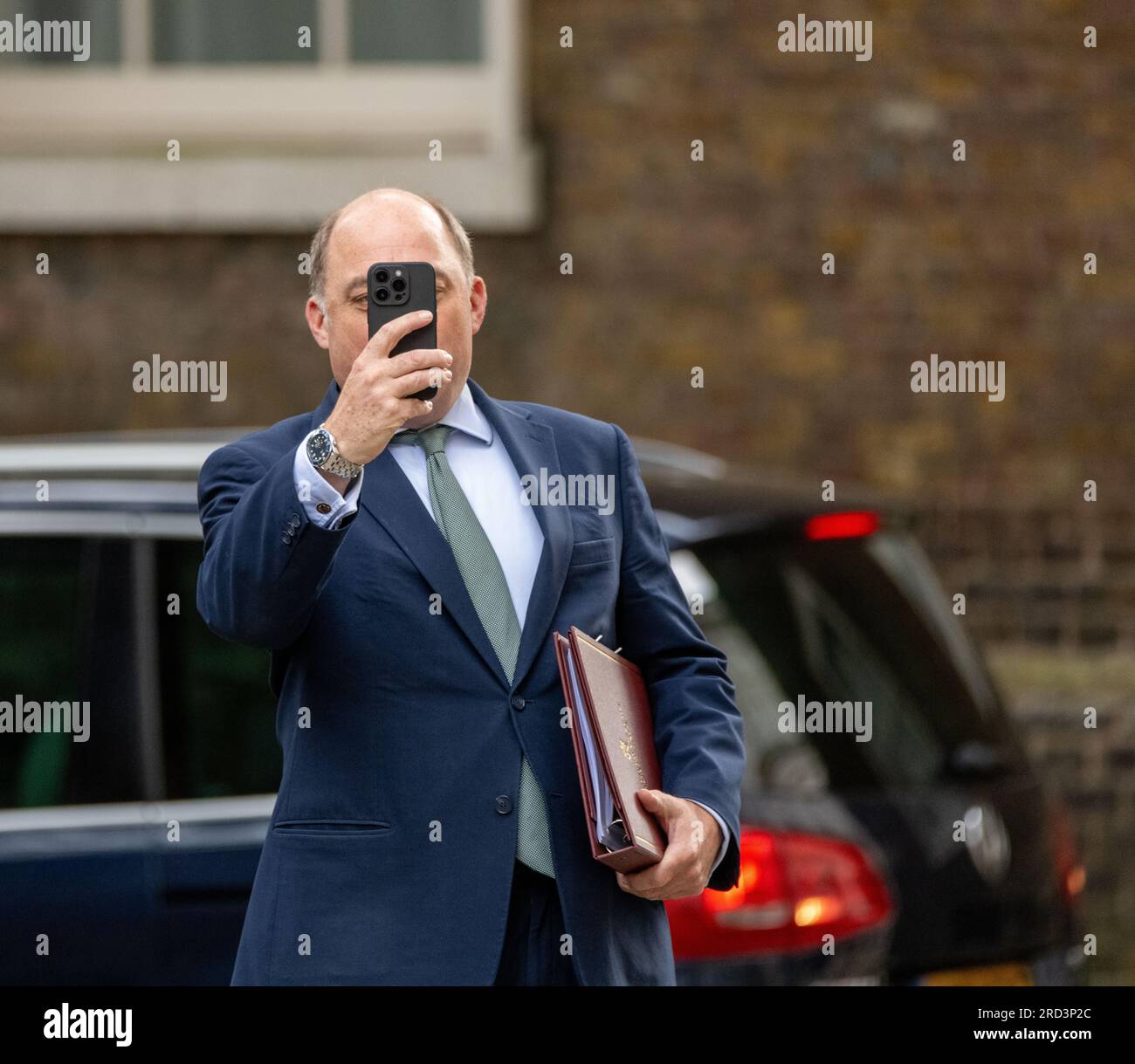 London, UK. 18th July, 2023. Ben Wallace, Defence Secretary, takes pictures of the waiting press as he arrives at what is possibly his last cabinet meeting at 10 Downing Street London. Credit: Ian Davidson/Alamy Live News Stock Photo