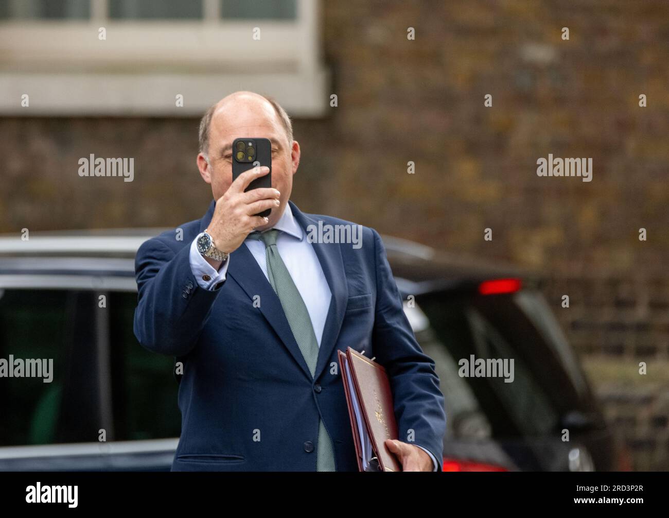 London, UK. 18th July, 2023. Ben Wallace, Defence Secretary, takes pictures of the waiting press as he arrives at what is possibly his last cabinet meeting at 10 Downing Street London. Credit: Ian Davidson/Alamy Live News Stock Photo
