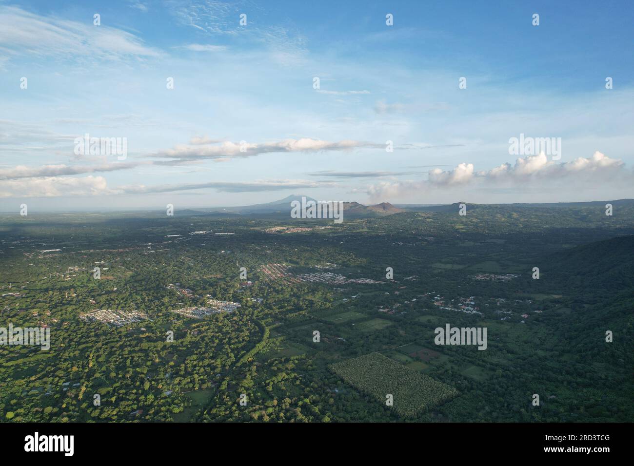Nicaragua green valley landscape with blue sky aerial drone view Stock Photo