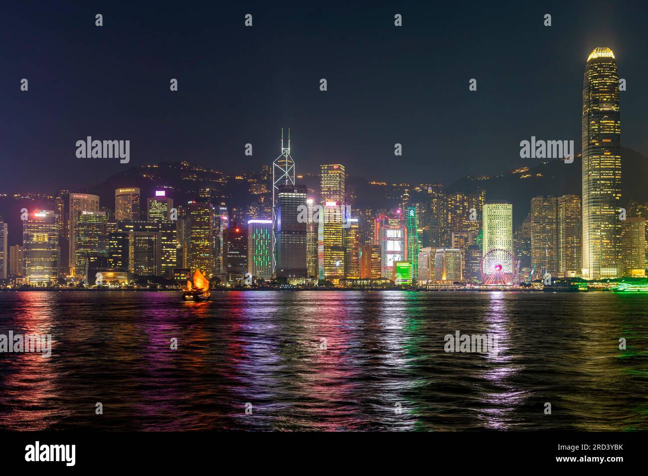 Hong Kong skyline at night with laser show, Victoria Harbour, SAR, China Stock Photo