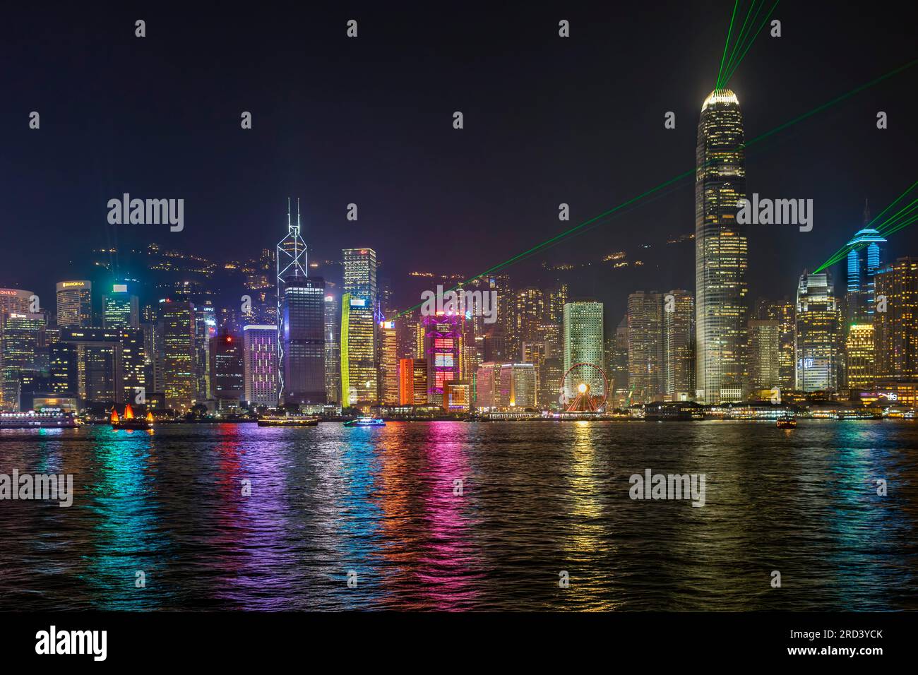 Hong Kong skyline at night with laser show, Victoria Harbour, SAR, China Stock Photo