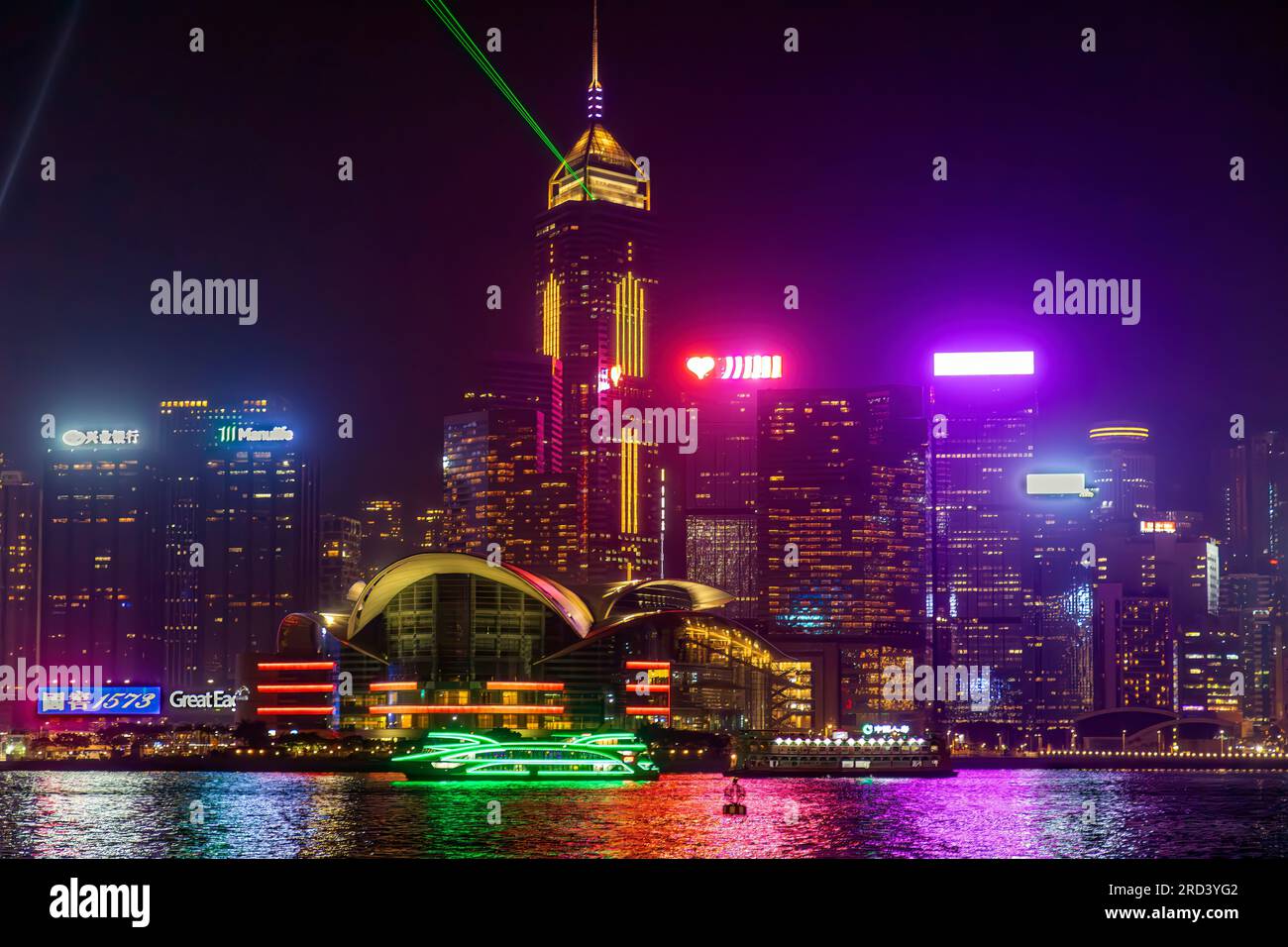 Hong Kong skyline at night with laser show, Victoria Harbour, SAR, China Stock Photo