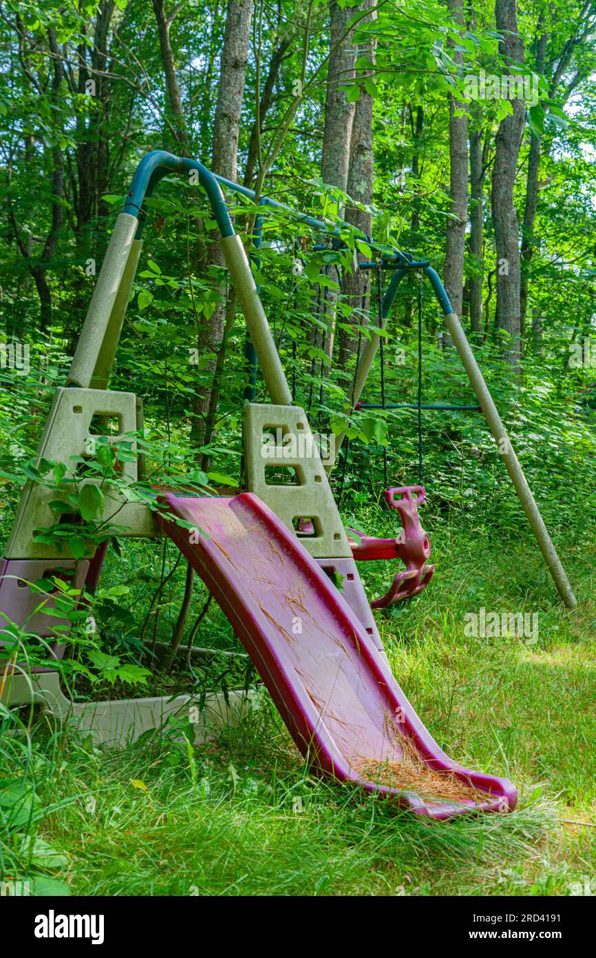 Abandoned childs swing set near Sparrow Lake Muskoka Ontario Canada
