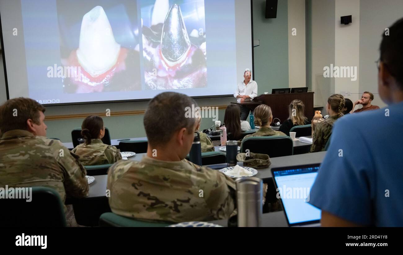 Boaz Arzi, University of California Davis School of Veterinary Medicine surgical and radiological sciences professor, discusses canine oral health as a part of the first military working dog (MWD) oral health joint symposium between Travis Air Force Base and UC Davis School of Veterinary Medicine in Davis, California, June 28, 2023. Six military dental residents, two military dental directors, and the base veterinarian attended the seminar along with five veterinary residents, two veterinary undergraduates and two professors from UC Davis. Stock Photo