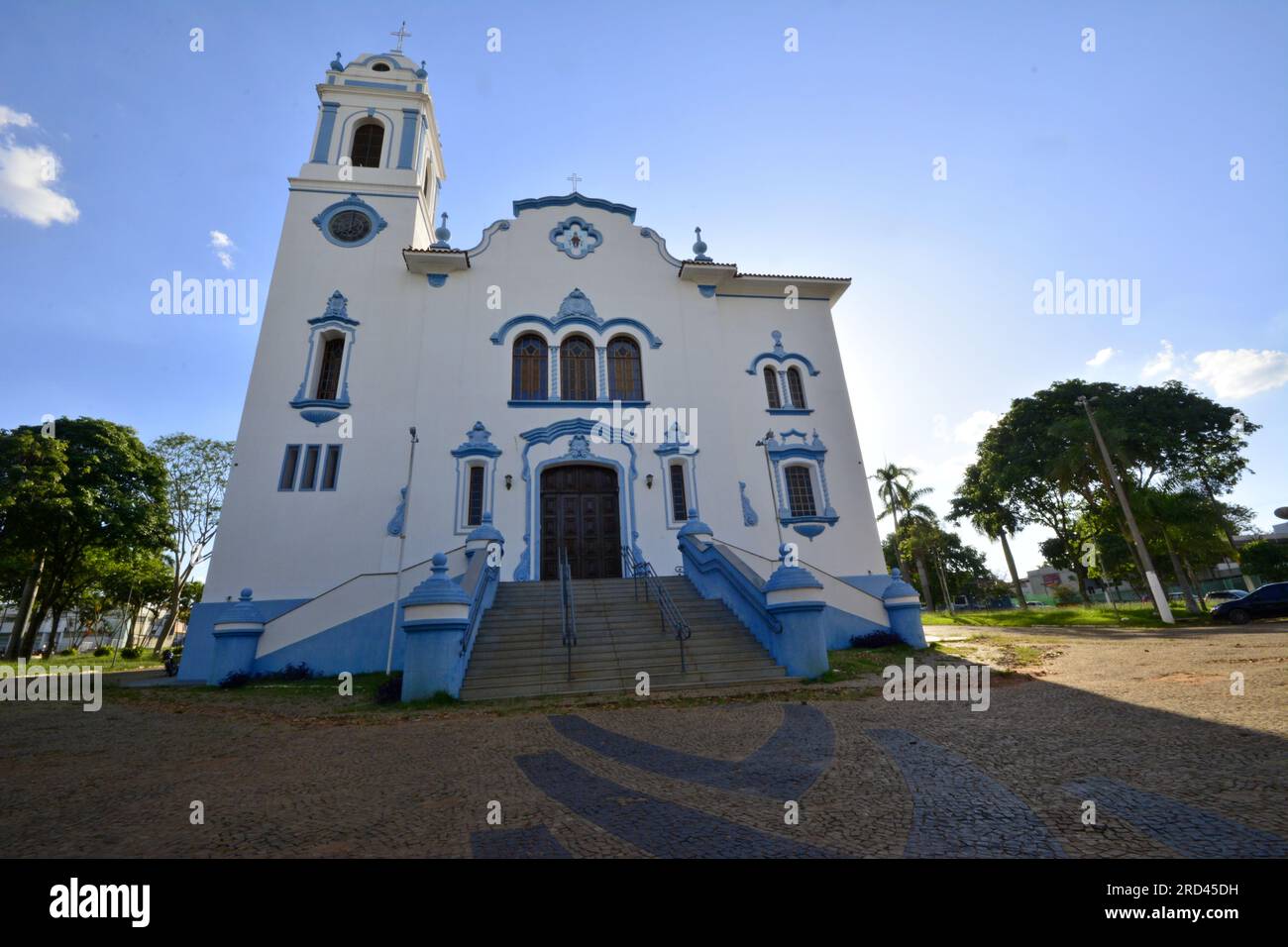 Catholic church. in wide-angle photo showing the facade of the old building. With staircase in the center Stock Photo