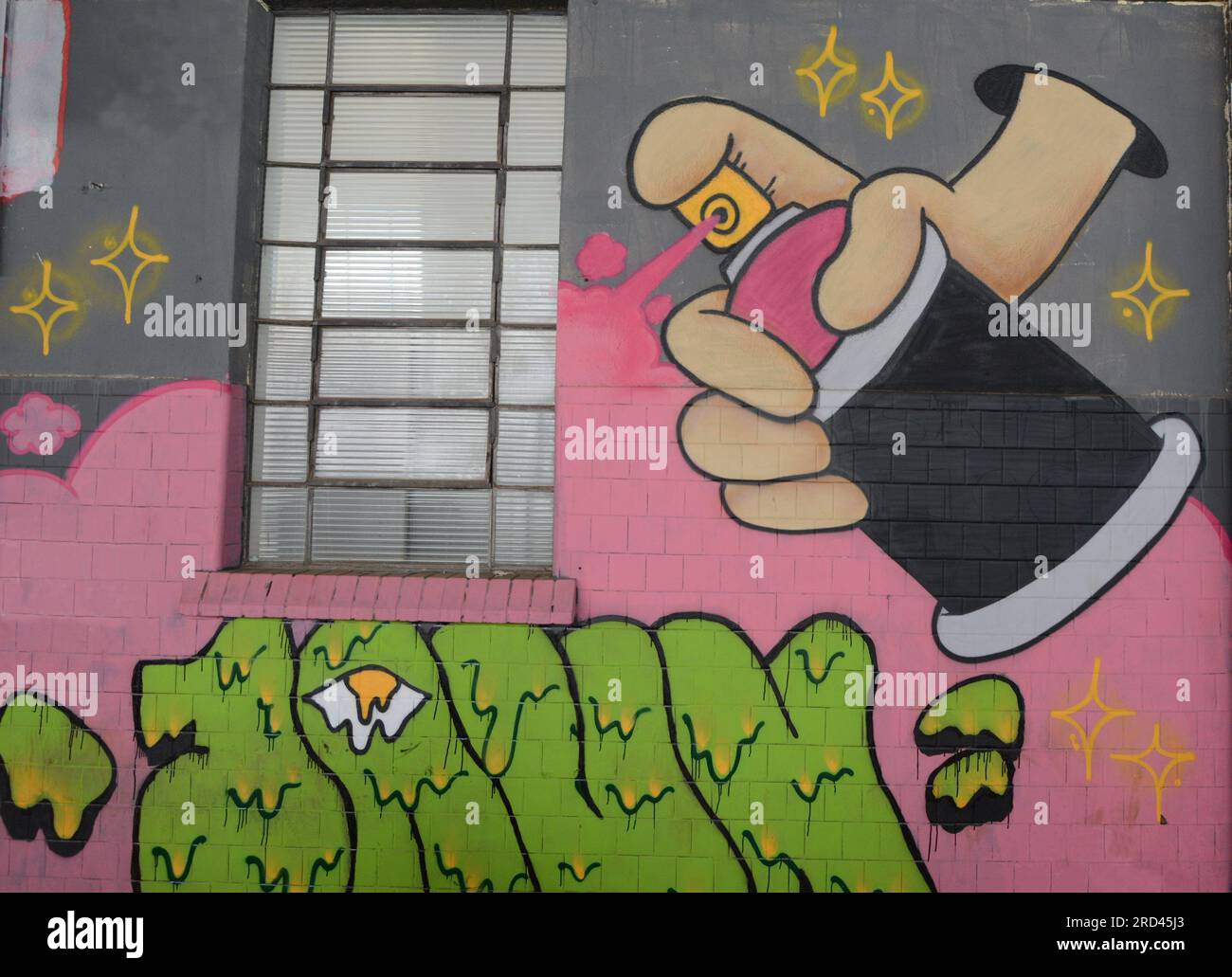 City: Marilia, São Paulo, Brazil - 2023 July 2023 : Graffiti on a masonry wall with a spray can design in various styles and colors. Brazil Stock Photo