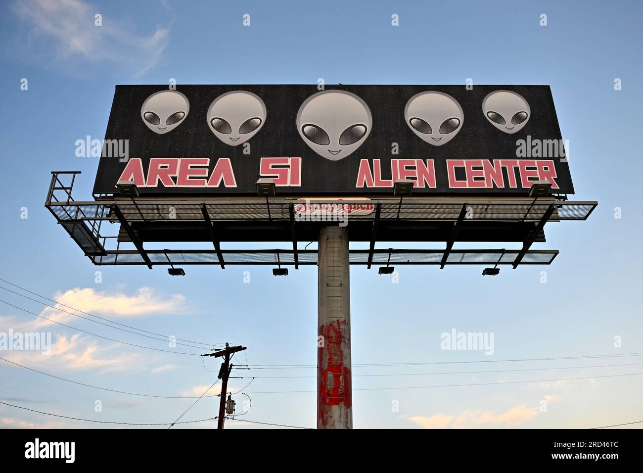 Amargosa Valley, Nevada, USA. 16th July, 2023. A billboard for the Area 51 Alien Center is seen at sunset on July 16, 2023, in Amagrosa Valley, Nevada. The roadside extraterrestrial-themed souvenir shop sits along U.S. Highway 95 about 90 miles north of Las Vegas and borders the southwest corner of the Nevada National Security Site, formally known as the Nevada Test Site, where the secret base Area 51 is located. (Credit Image: © David Becker/ZUMA Press Wire) EDITORIAL USAGE ONLY! Not for Commercial USAGE! Stock Photo