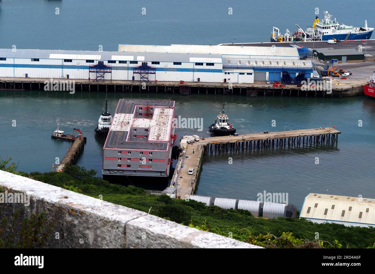 Portland Port, Dorset, UK. 18th July, 2023. The Bibby Stockholm immigration barge arriving at Portland Port, Dorset UK. Credit: Dorset Media Service/Alamy Live News Stock Photo
